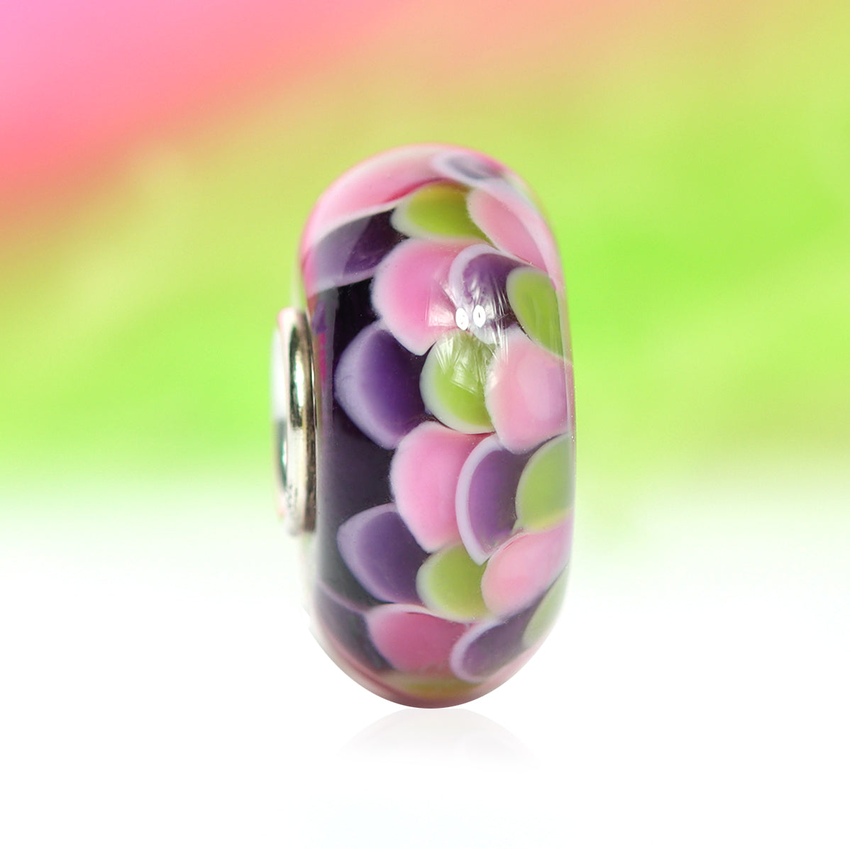 Ogerbeads Bead of the Month March – 2024 pink; green; purple glass Bead by The Alternative Bead. Your official Ogerbeads Retailer from Germany