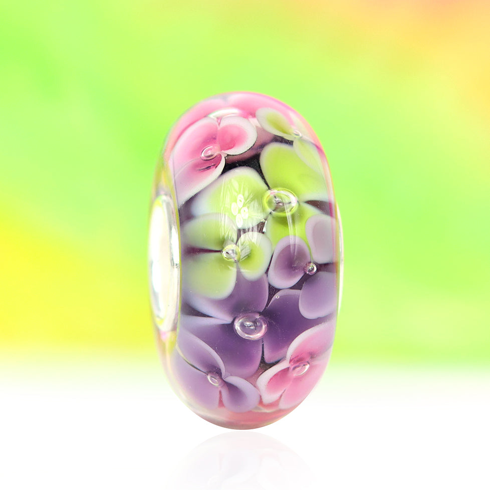 Ogerbeads Bead of the Month May – 2024 pink; green; purple glass Bead by The Alternative Bead. Your official Ogerbeads Retailer from Germany