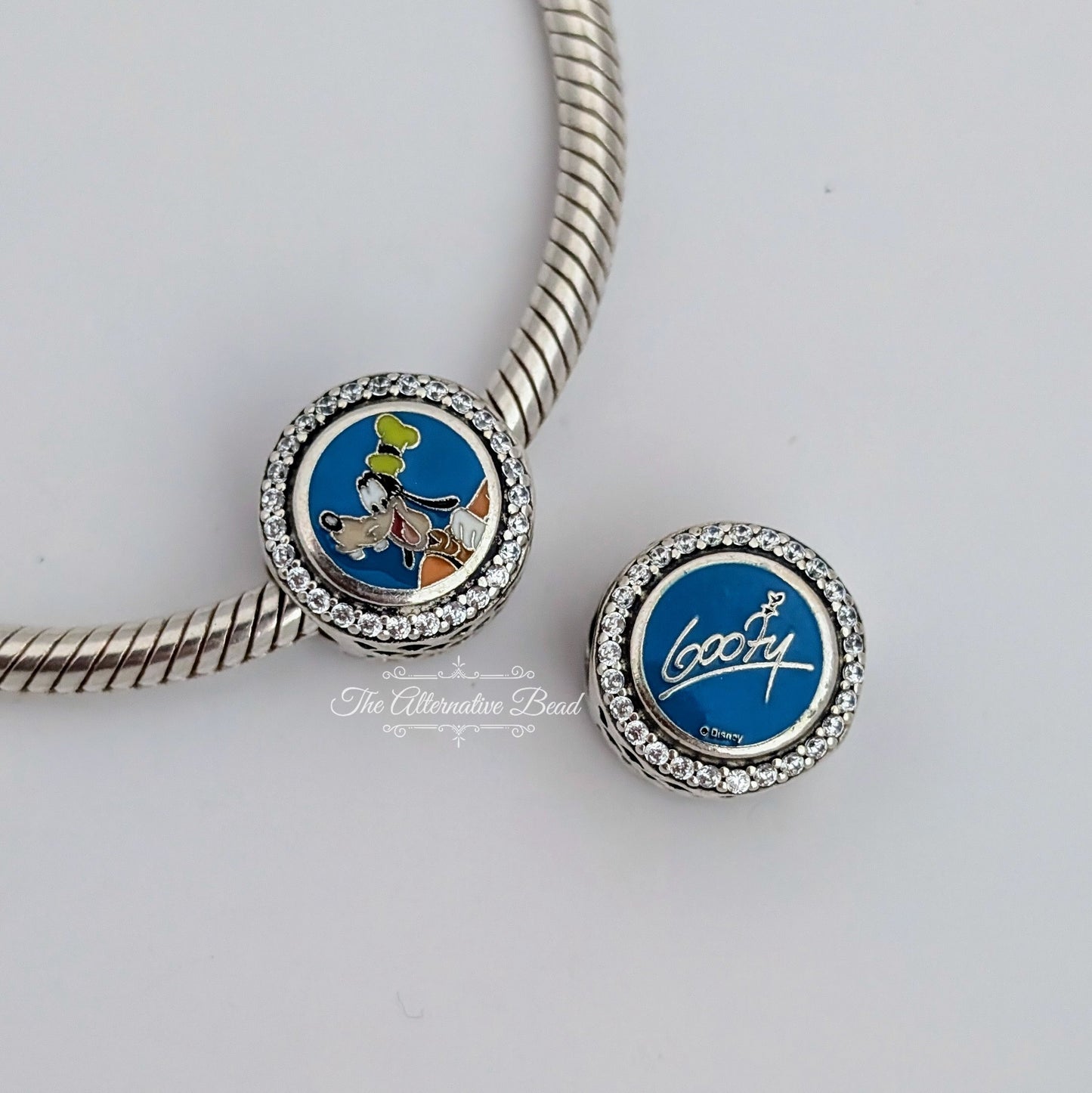 Disney x Pandora Goofy Autograph blue sterling-silver; enamel Bead by The Alternative Bead. Your official Disney x Pandora Retailer from Germany
