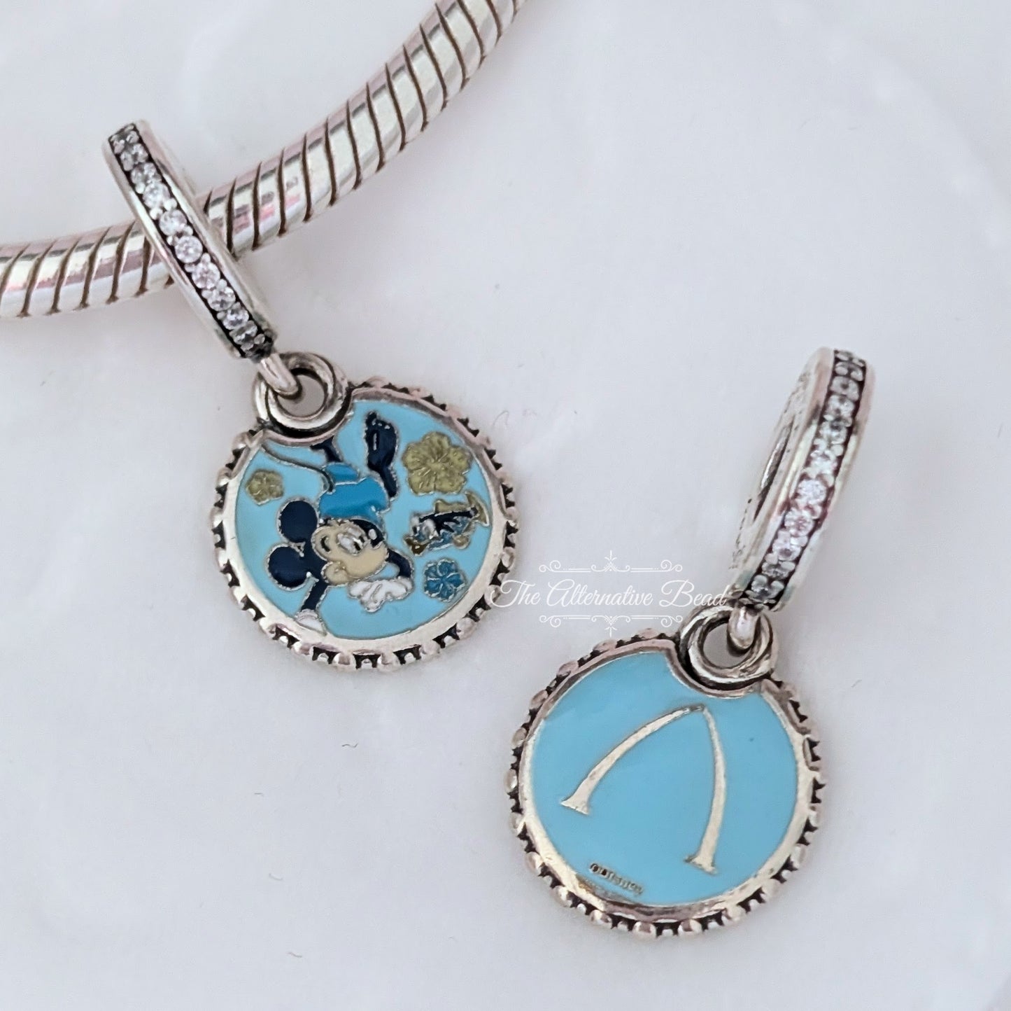Disney x Pandora Mickey Mouse Aulani Diving Dangle blue sterling-silver; enamel Dangle by The Alternative Bead. Your official Disney x Pandora Retailer from Germany