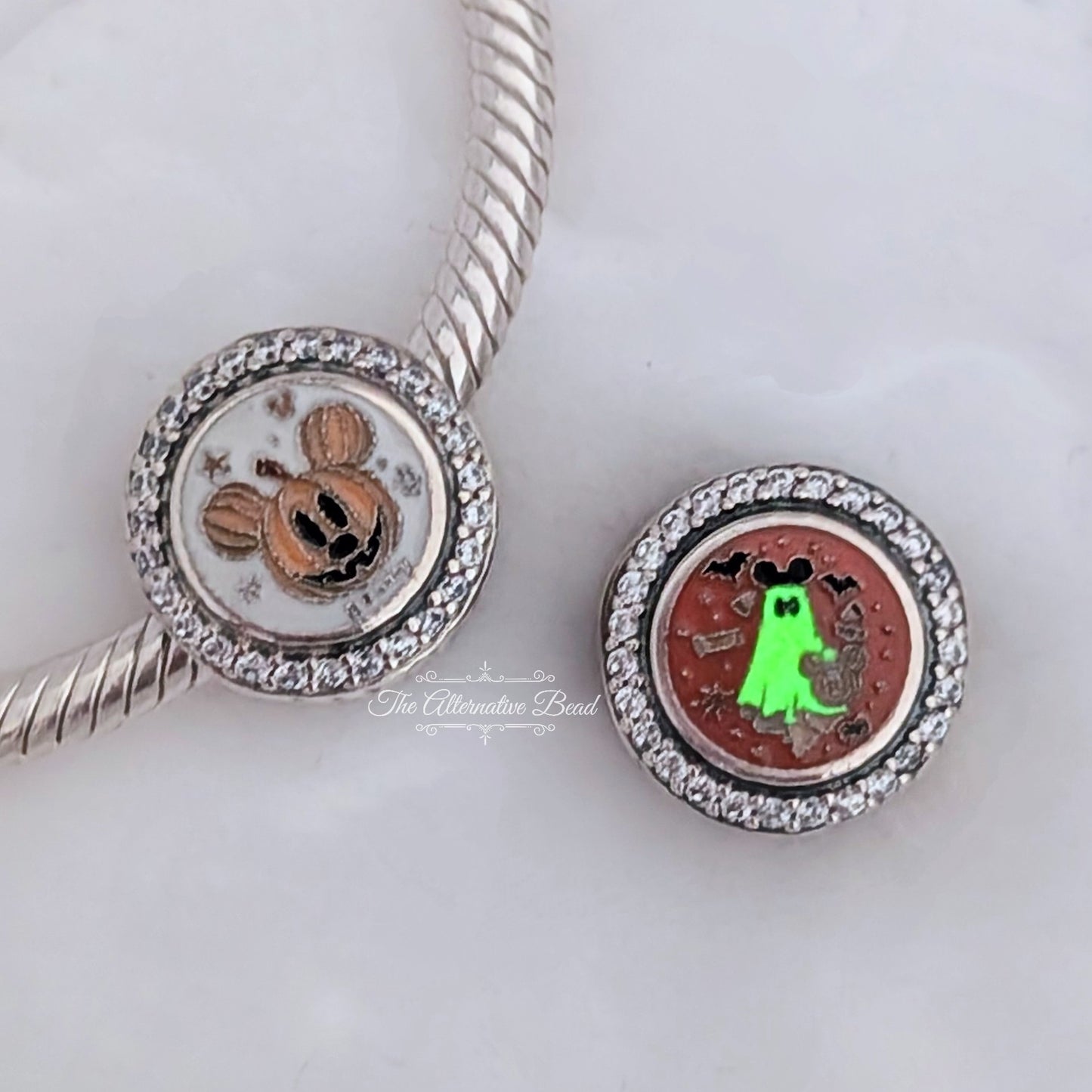 Disney x Pandora Mickey Mouse Pumpkin Ghost Halloween 2024 silver; orange; glow-in-the-dark sterling-silver; enamel Bead by The Alternative Bead. Your official Disney x Pandora Retailer from Germany