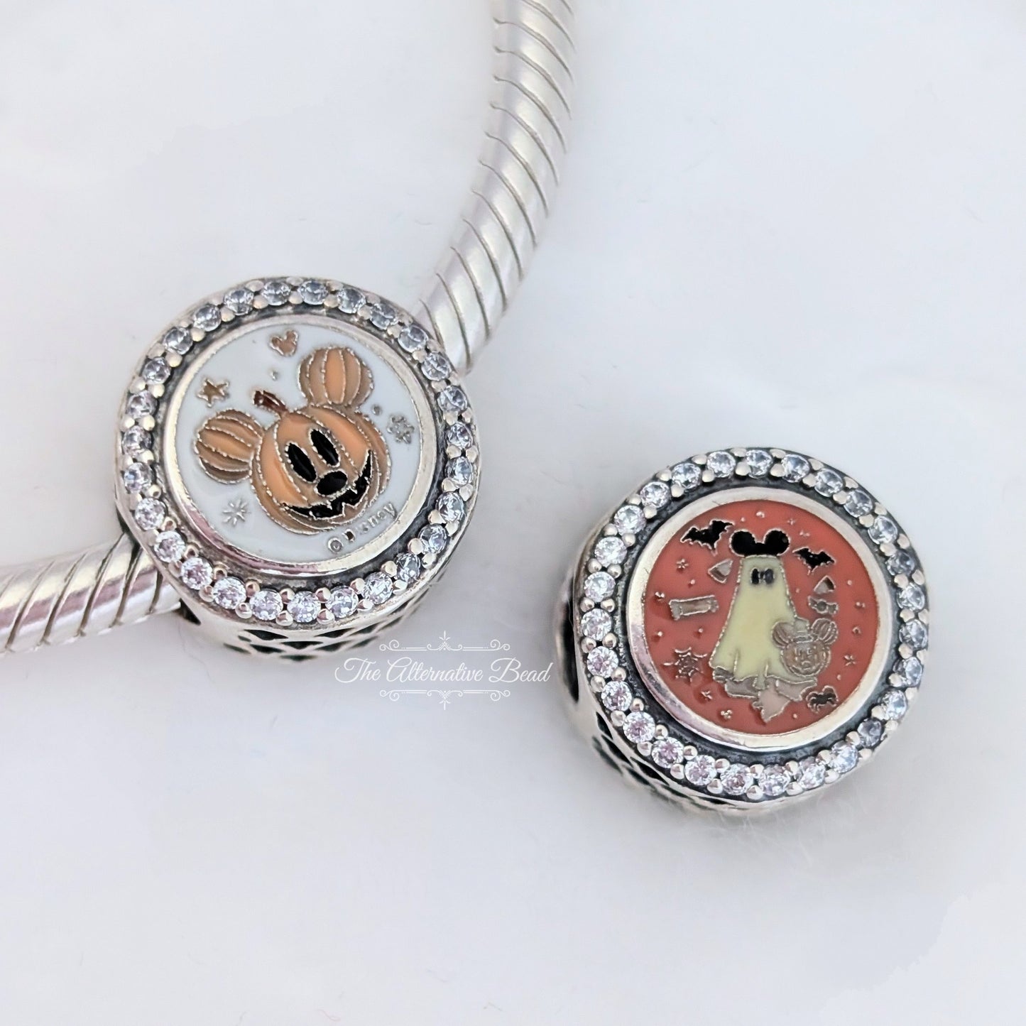 Disney x Pandora Mickey Mouse Pumpkin Ghost Halloween 2024 silver; orange; glow-in-the-dark sterling-silver; enamel Bead by The Alternative Bead. Your official Disney x Pandora Retailer from Germany