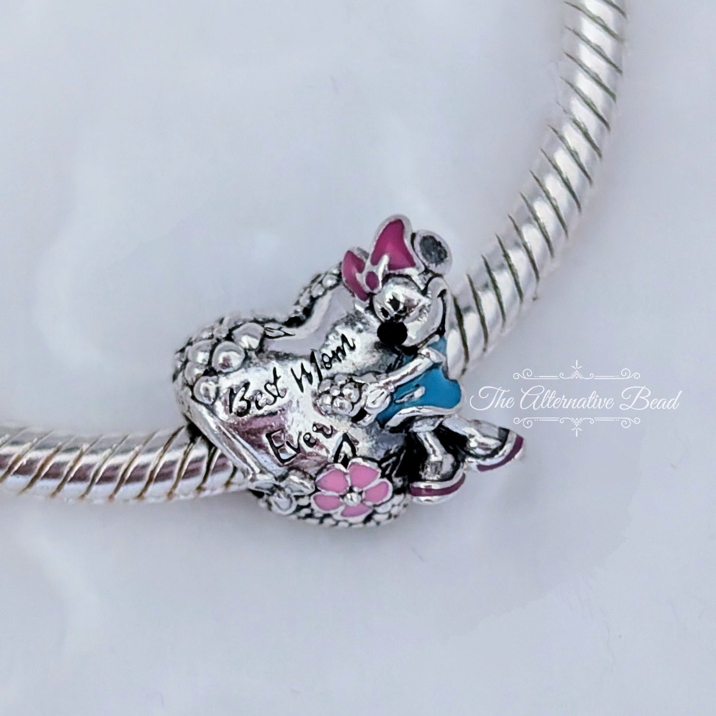 Disney x Pandora Minnie Mouse Best Mom Ever silver; pink; blue sterling-silver; enamel Bead by The Alternative Bead. Your official Disney x Pandora Retailer from Germany