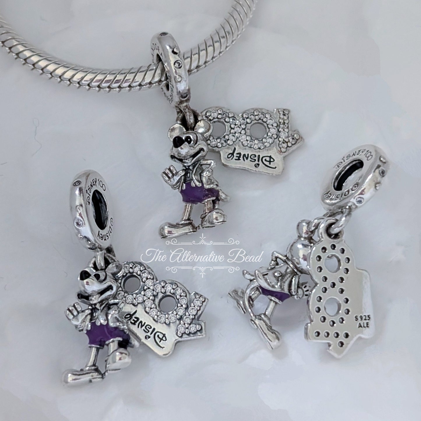 Disney x Pandora Disney 100th Anniversary Mickey Dangle silver; purple sterling-silver; enamel Dangle by The Alternative Bead. Your official Disney x Pandora Retailer from Germany