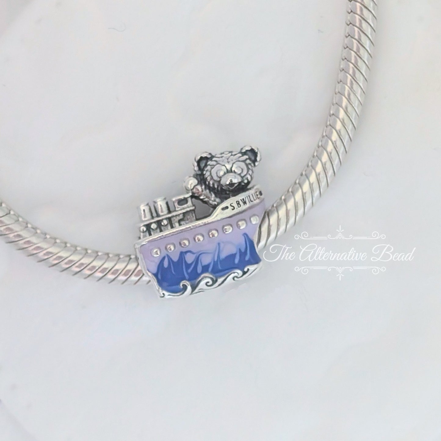 Disney x Pandora Duffy the Bear in Steamboat Willie silver; blue; purple sterling-silver; enamel Bead by The Alternative Bead. Your official Disney x Pandora Retailer from Germany