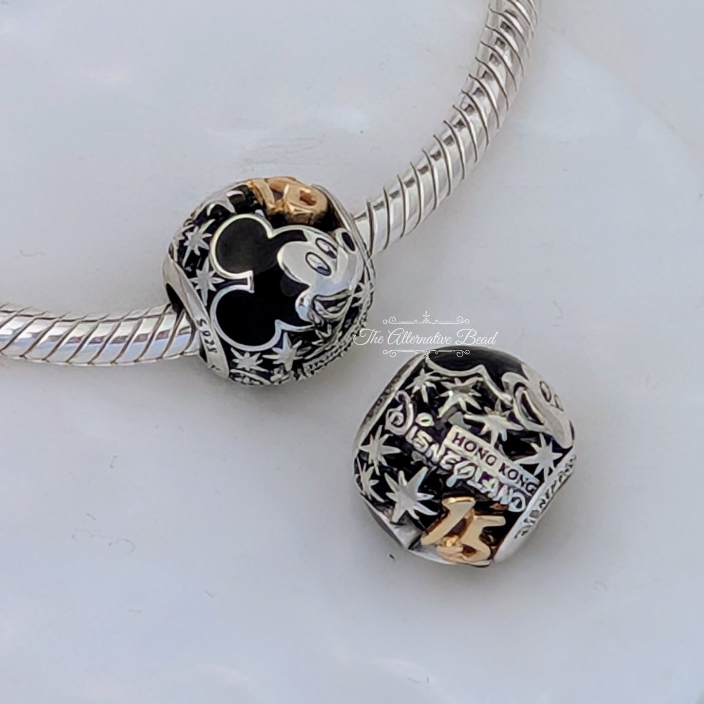 Disney x Pandora Hong Kong Disneyland 15h Anniversary Bicolor silver; gold sterling-silver; gold Bead by The Alternative Bead. Your official Disney x Pandora Retailer from Germany