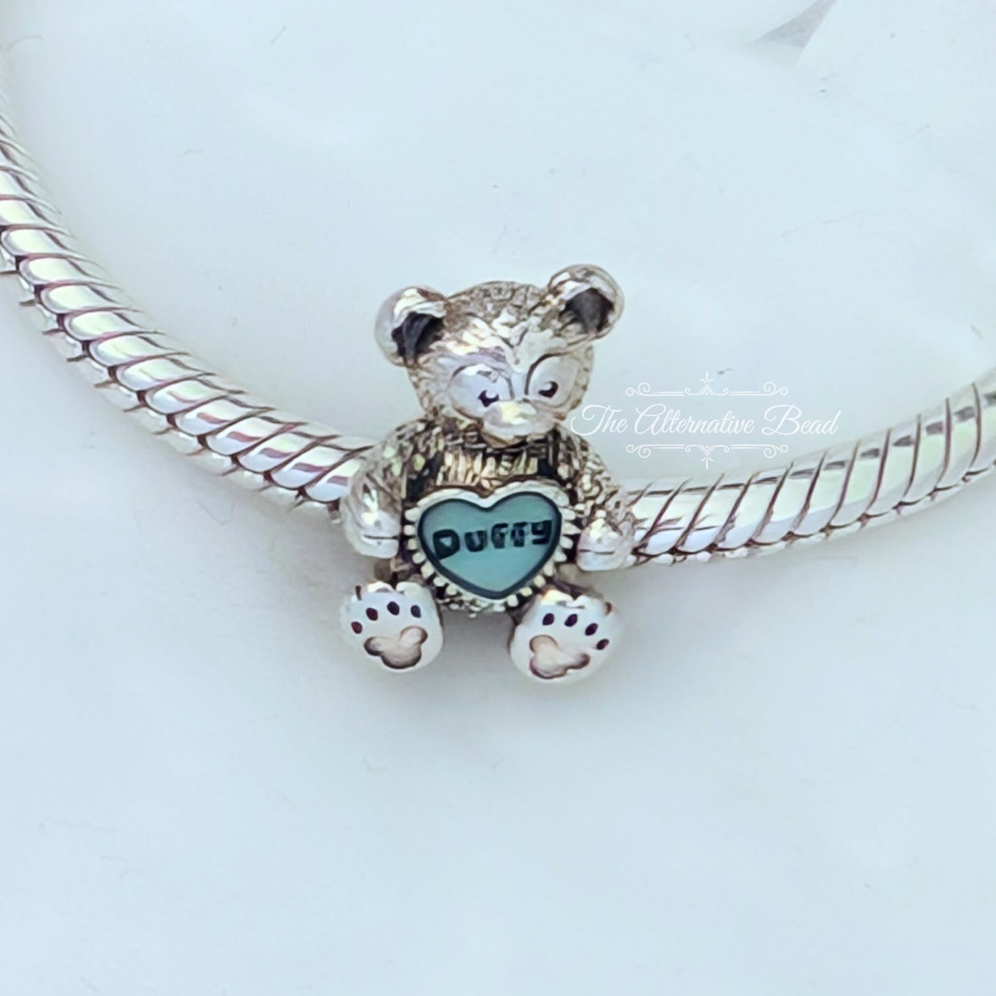 Disney x Pandora Duffy the Bear silver and blue sterling-silver Bead by The Alternative Bead. Your official Disney x Pandora Retailer from Germany