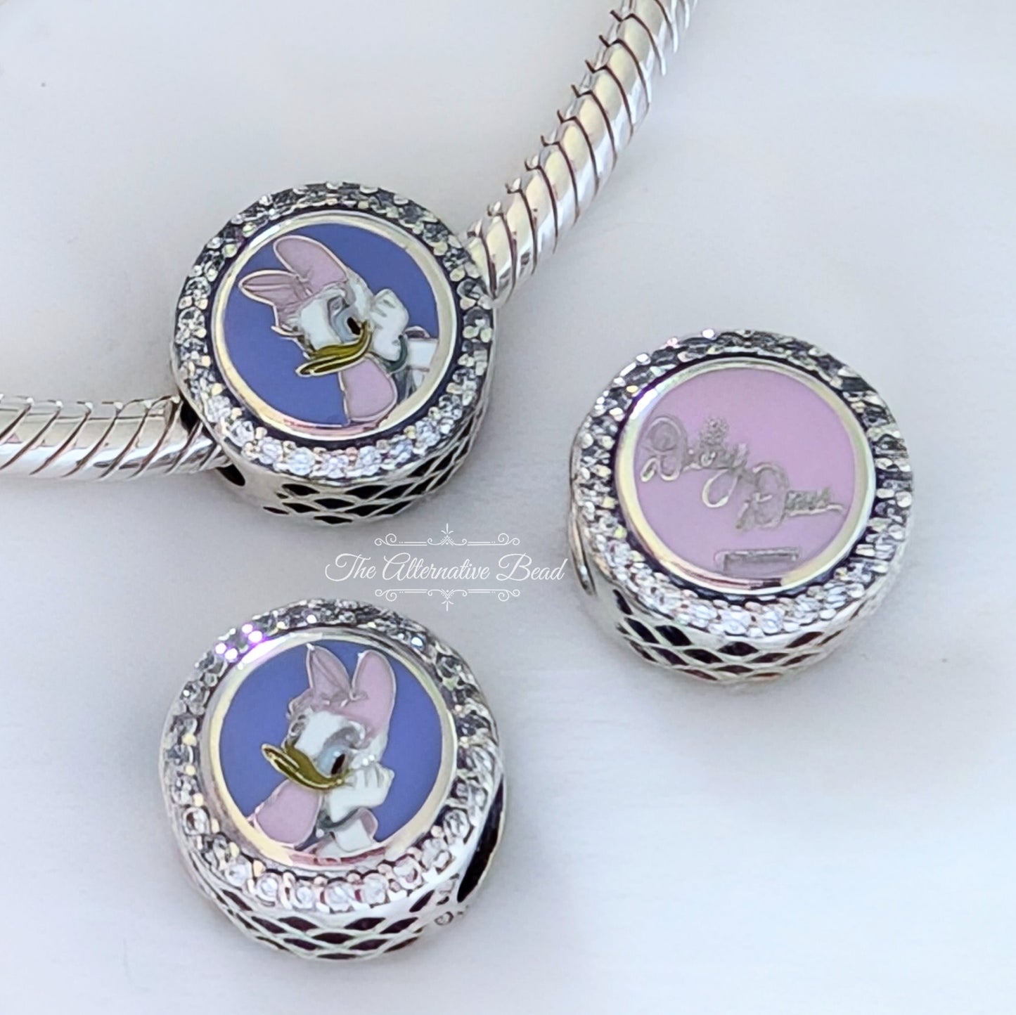 Disney x Pandora Daisy Duck Autograph pink; purple sterling-silver; enamel Bead by The Alternative Bead. Your official Disney x Pandora Retailer from Germany