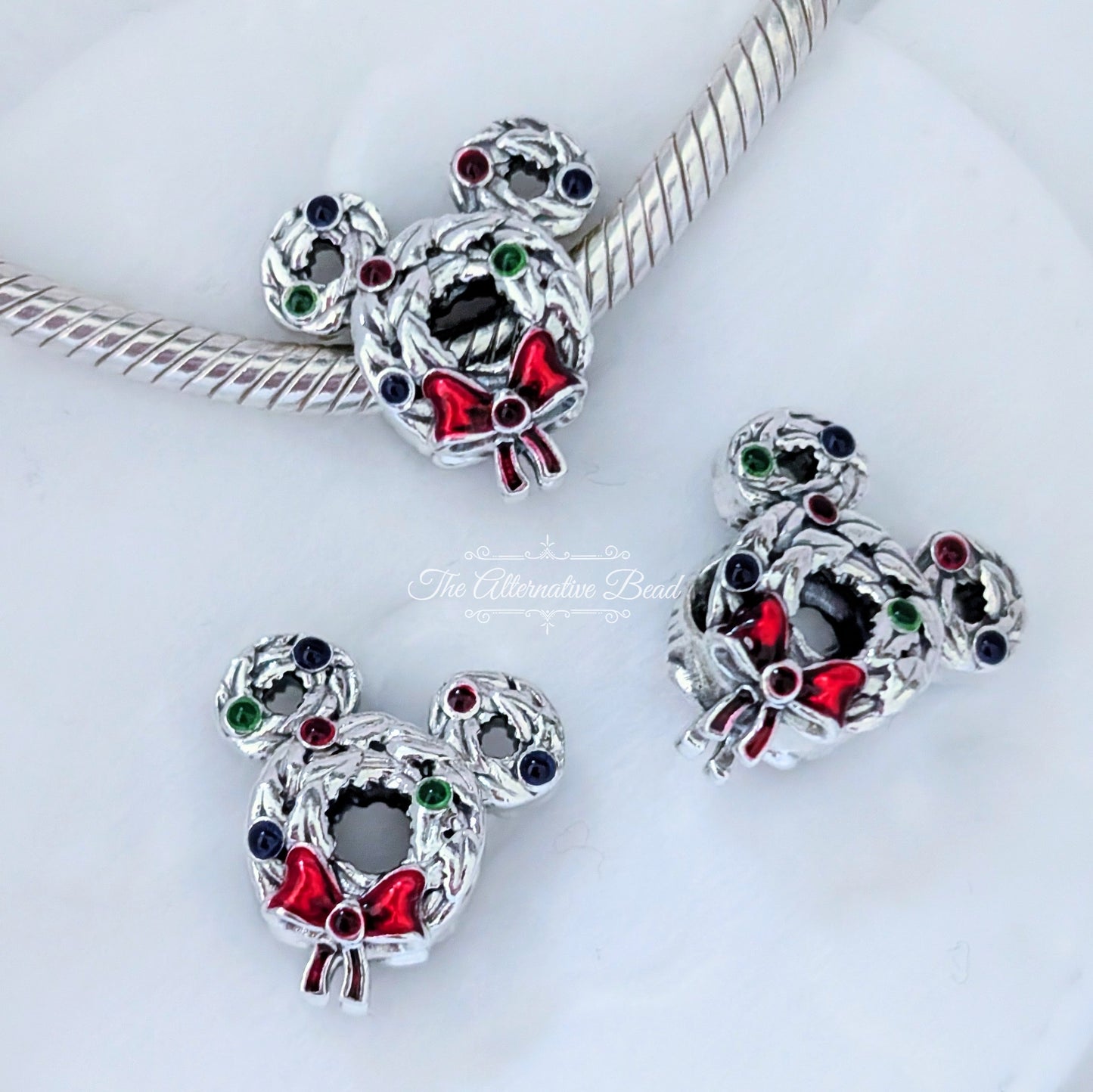 Disney x Pandora Mickey Mouse Christmas Wreath red; silver sterling-silver; enamel Bead by The Alternative Bead. Your official Disney x Pandora Retailer from Germany