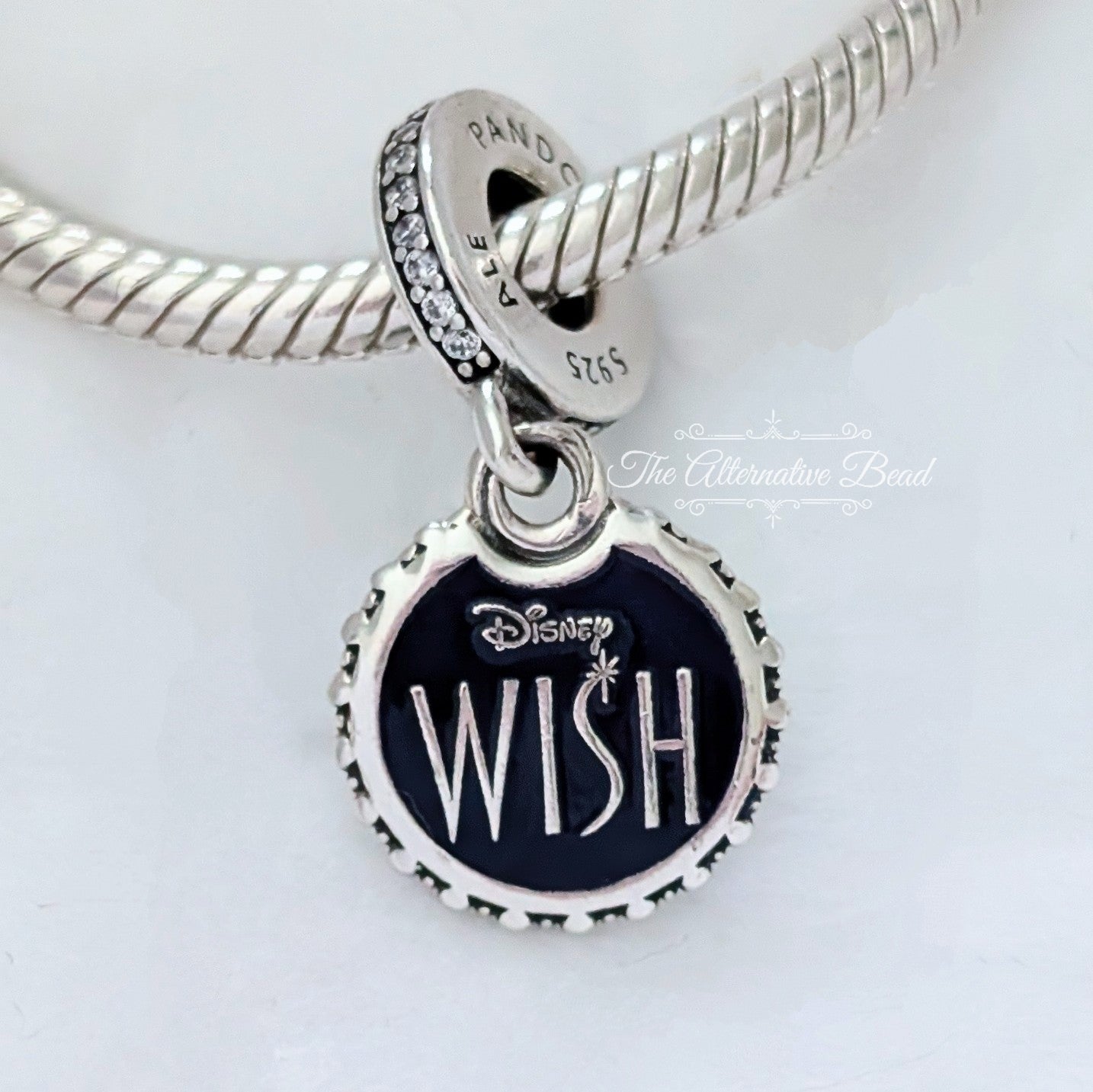 Disney x Pandora Wish Star Dangle black and silver sterling-silver and enamel Dangle by The Alternative Bead. Your official Disney x Pandora Retailer from Germany