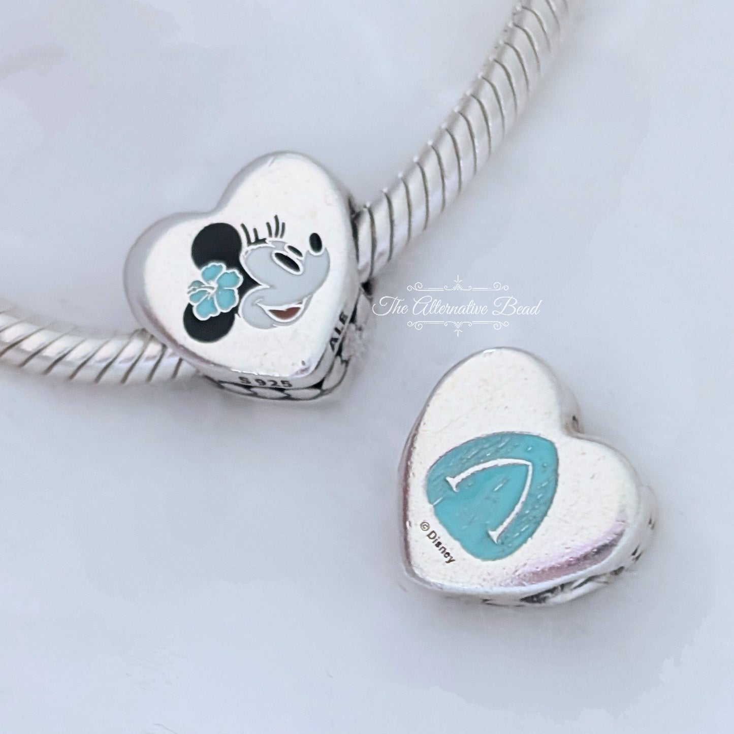 Disney x Pandora Minnie Mouse Aulani Charm silver; blue sterling-silver; enamel Bead by The Alternative Bead. Your official Disney x Pandora Retailer from Germany