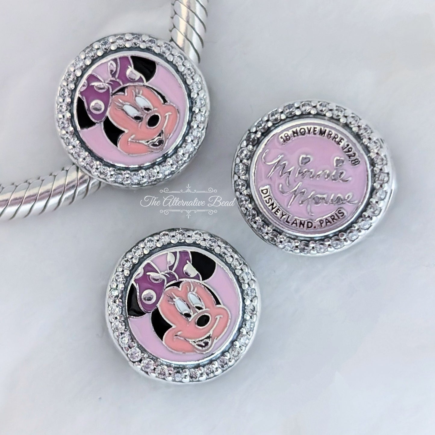 Disney x Pandora Minnie Mouse 96th Anniversary Charm Nov 18th 1928 (Limited Edition) pink enamel; sterling-silver Bead by The Alternative Bead. Your official Disney x Pandora Retailer from Germany