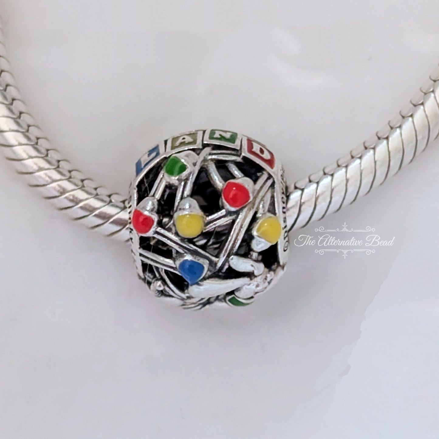 Disney x Pandora Pixar Parks Toy Story Land Charm silver; red; yellow sterling-silver; enamel Bead by The Alternative Bead. Your official Disney x Pandora Retailer from Germany