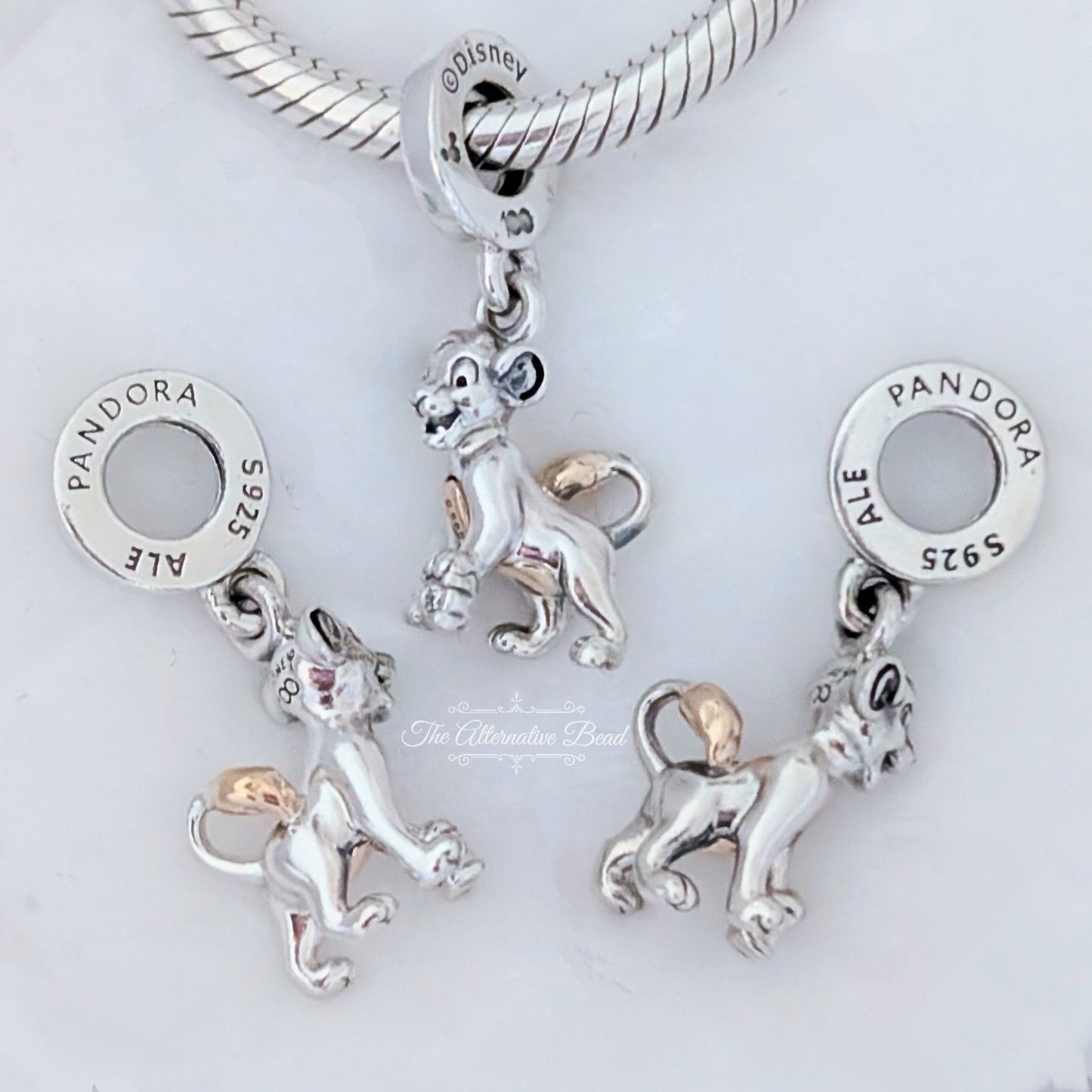 Disney x Pandora Disney 100th Anniversary Simba Lab-grown Diamond Dangle Charm silver; gold sterling-silver; gold; diamond Dangle by The Alternative Bead. Your official Disney x Pandora Retailer from Germany