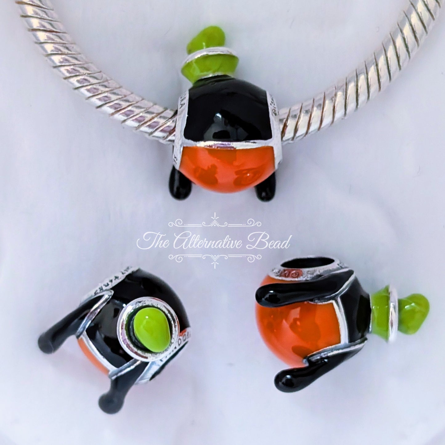 Disney x Pandora Goofy Icon black; orange; green sterling-silver; enamel Bead by The Alternative Bead. Your official Disney x Pandora Retailer from Germany