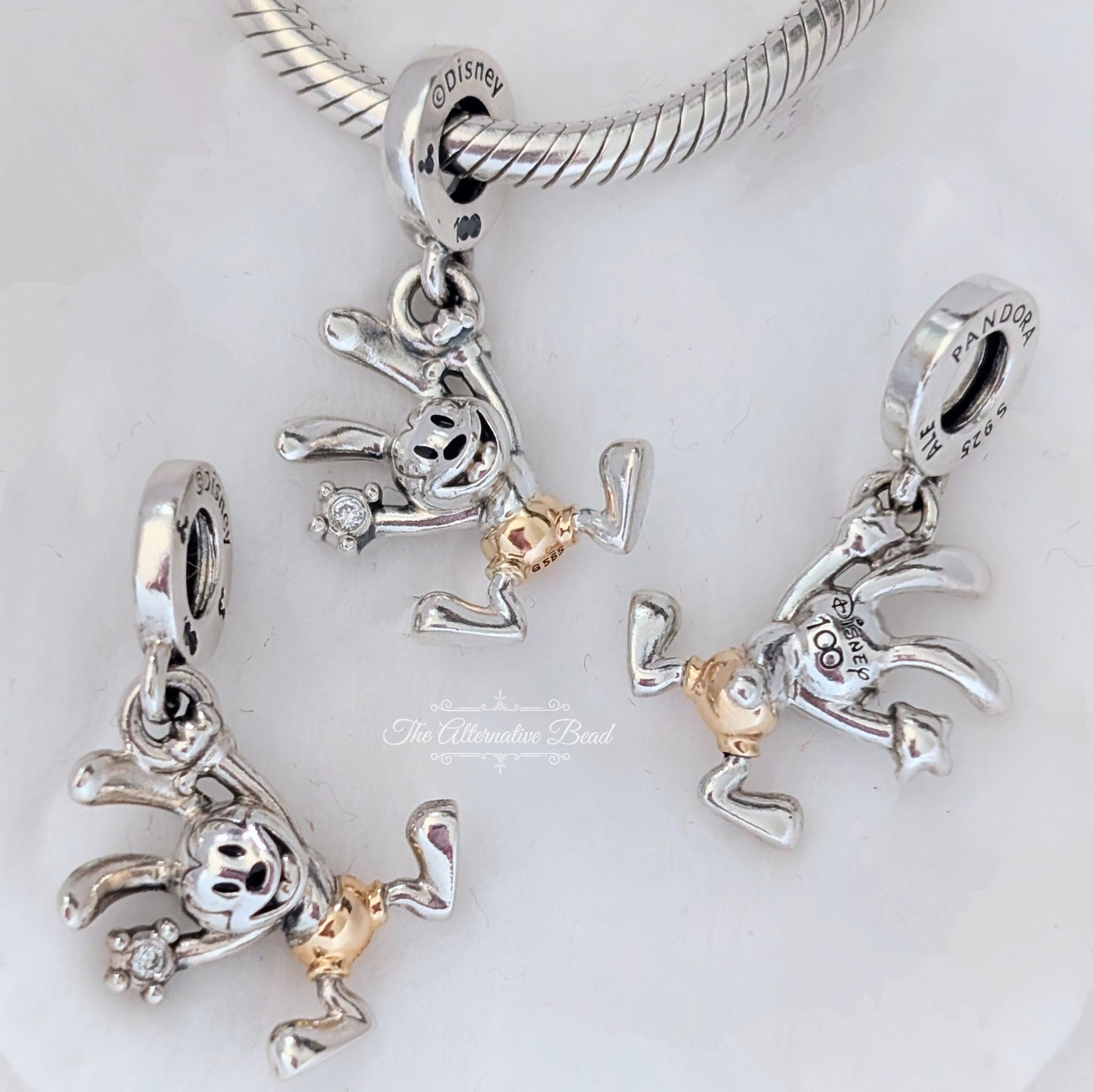 Disney x Pandora Disney 100th Anniversary Oswald Lab-grown Diamond Dangle Charm silver; gold sterling-silver; gold Dangle by The Alternative Bead. Your official Disney x Pandora Retailer from Germany