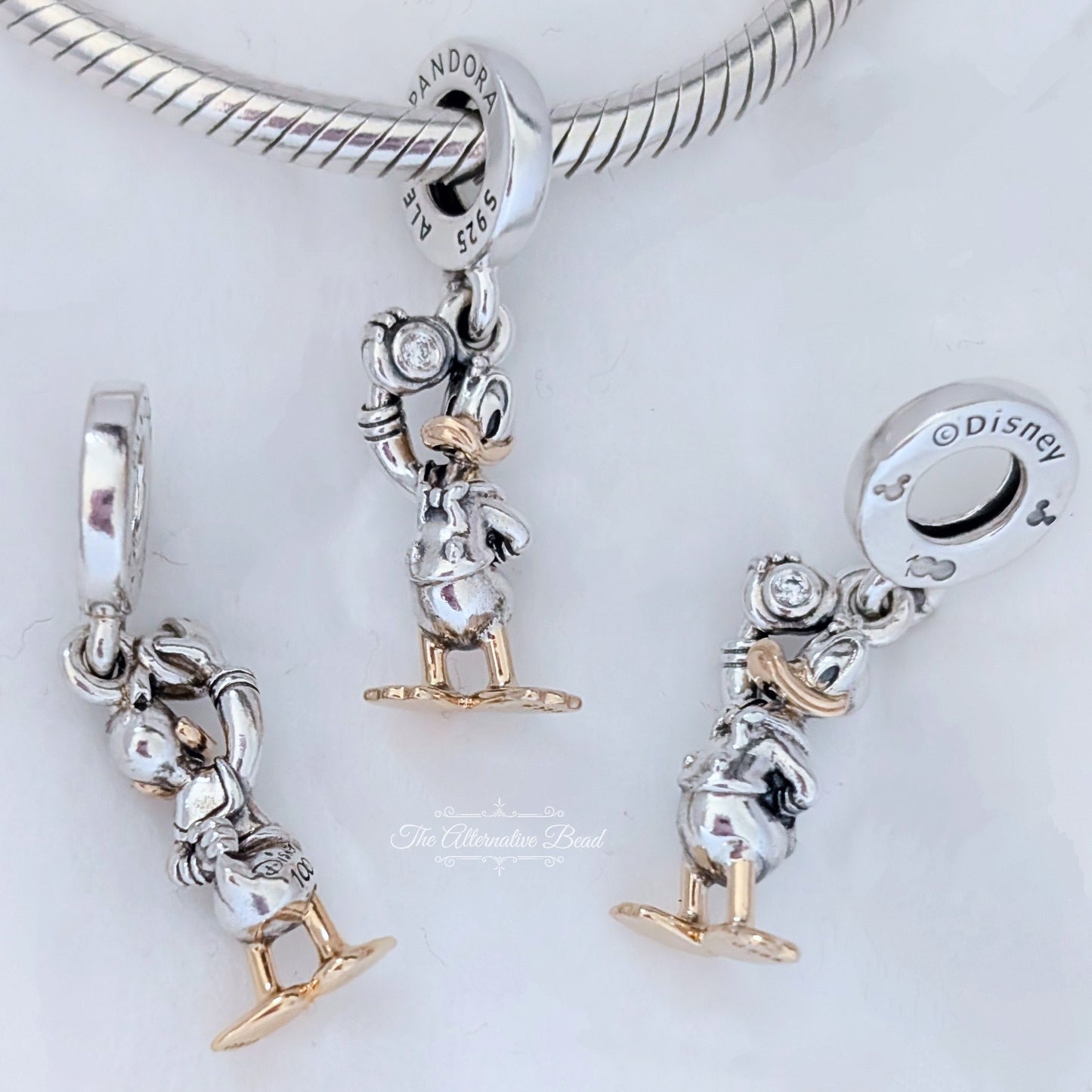 Disney x Pandora Disney 100th Anniversary Donald Lab-grown Diamond Dangle Charm silver; gold sterling-silver; gold Dangle by The Alternative Bead. Your official Disney x Pandora Retailer from Germany