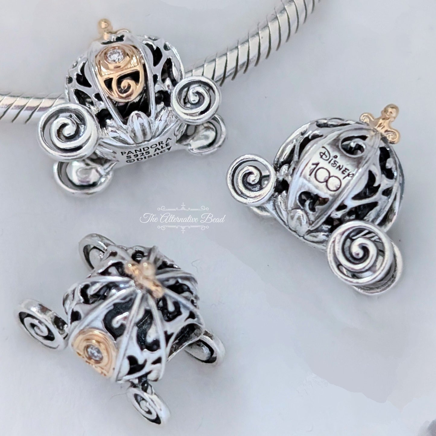 Disney x Pandora Disney 100th Anniversary Cinderella's Enchanted Carriage Dangle Charm silver; gold sterling-silver; gold Bead by The Alternative Bead. Your official Disney x Pandora Retailer from Germany