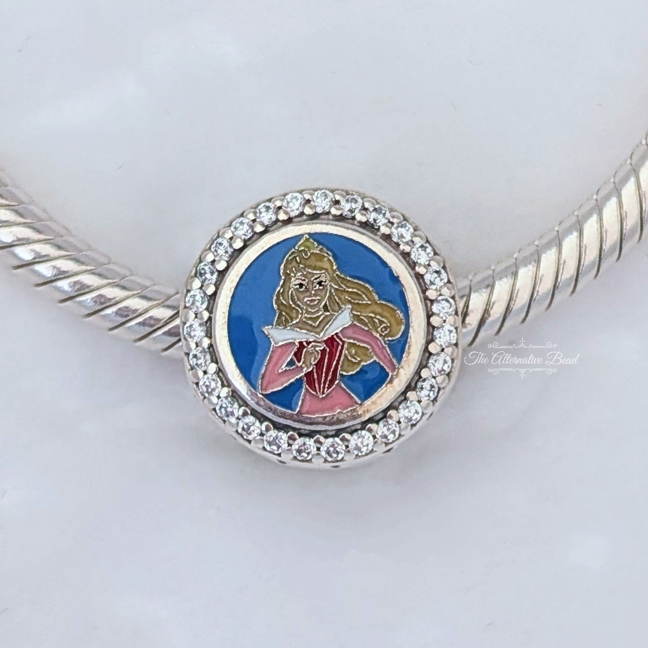 Disney x Pandora RunDisney 2025 Disneyland Princess Half Marathon 13.1k Sleeping Beauty silver; blue; pink sterling-silver; enamel Bead by The Alternative Bead. Your official Disney x Pandora Retailer from Germany