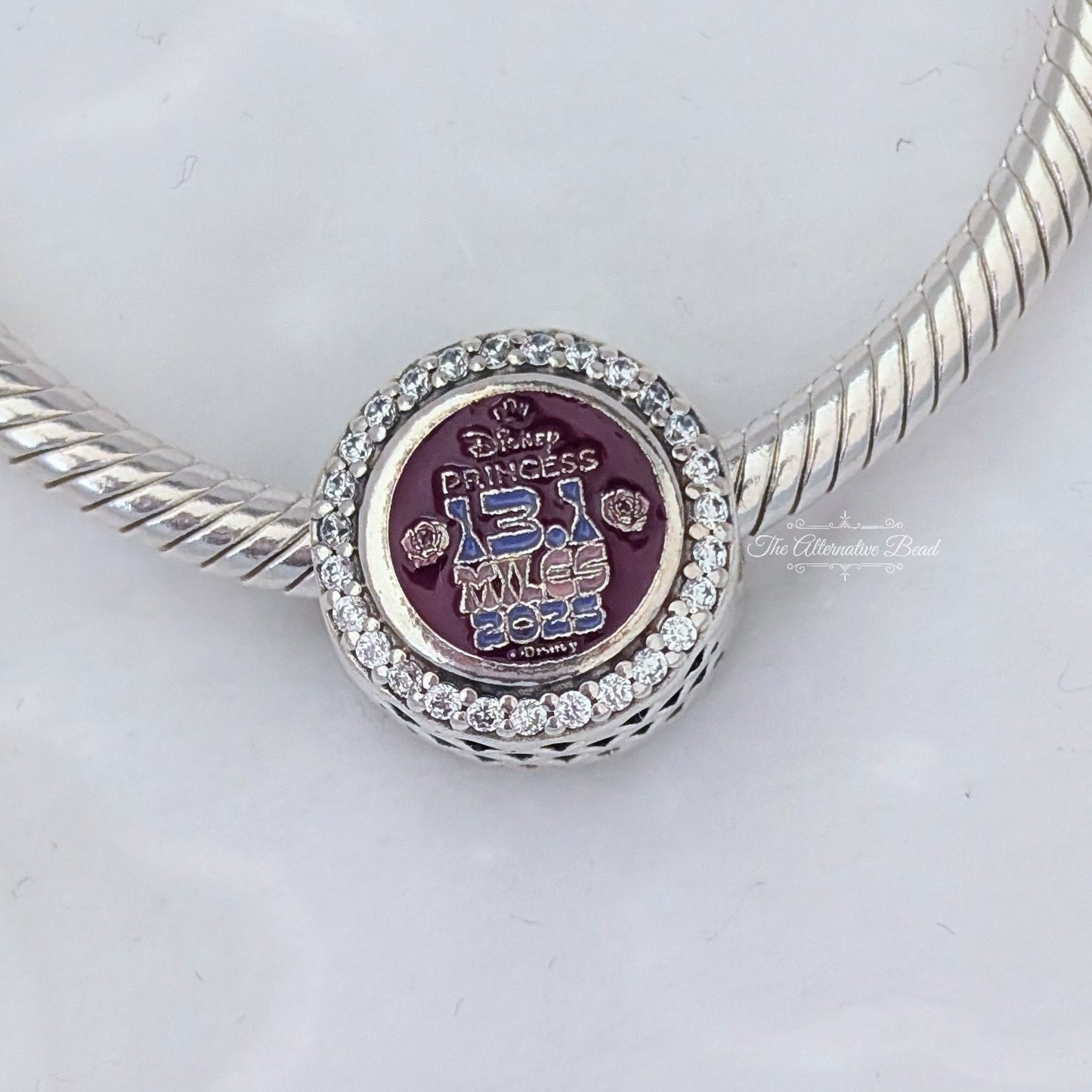 Disney x Pandora RunDisney 2025 Disneyland Princess Half Marathon 13.1k Sleeping Beauty silver; blue; pink sterling-silver; enamel Bead by The Alternative Bead. Your official Disney x Pandora Retailer from Germany