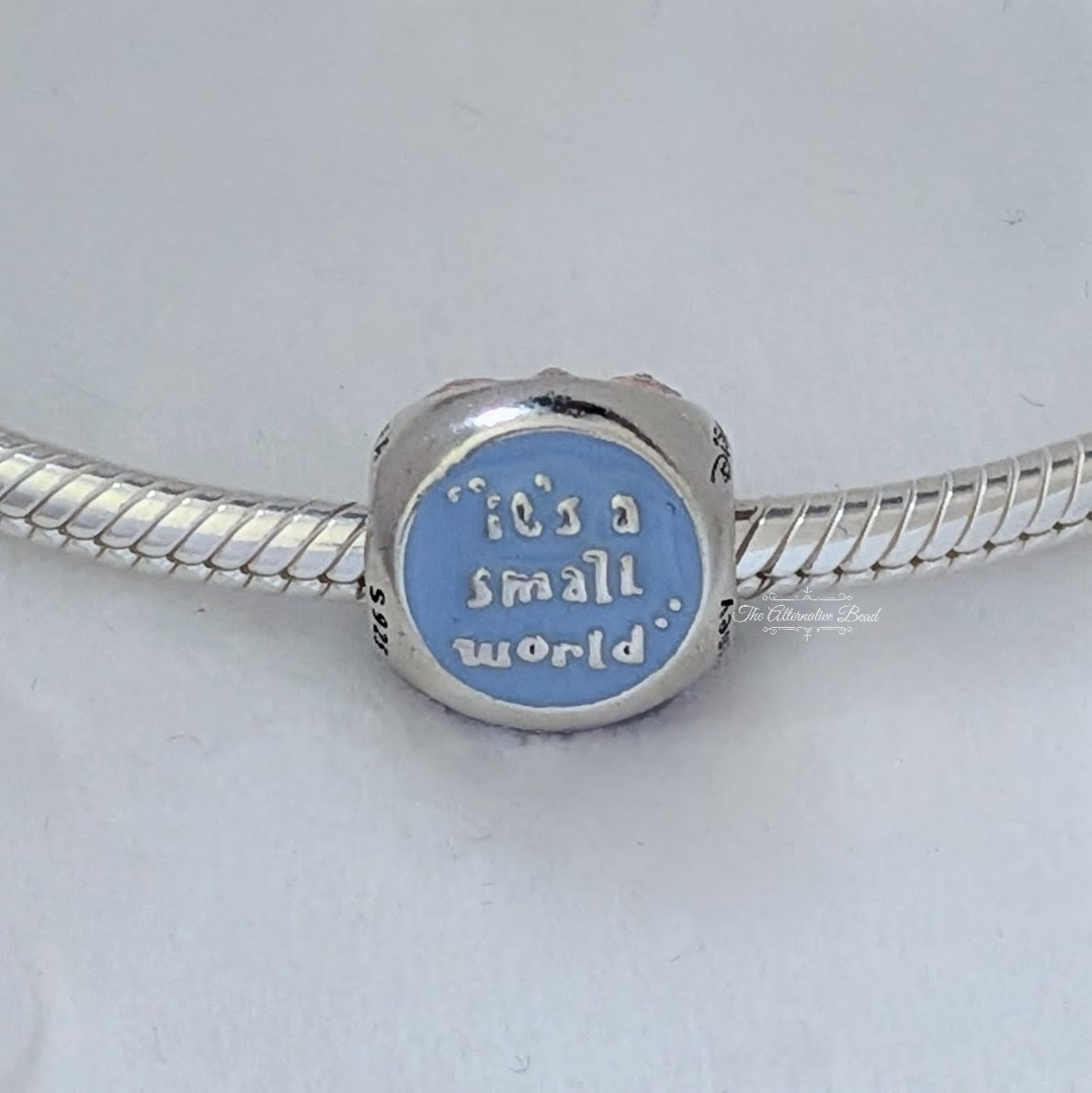 Disney x Pandora It's a Small World Charm retired silver; pink; purple; blue sterling-silver; enamel Bead by The Alternative Bead. Your Jewelry Retailer from Germany