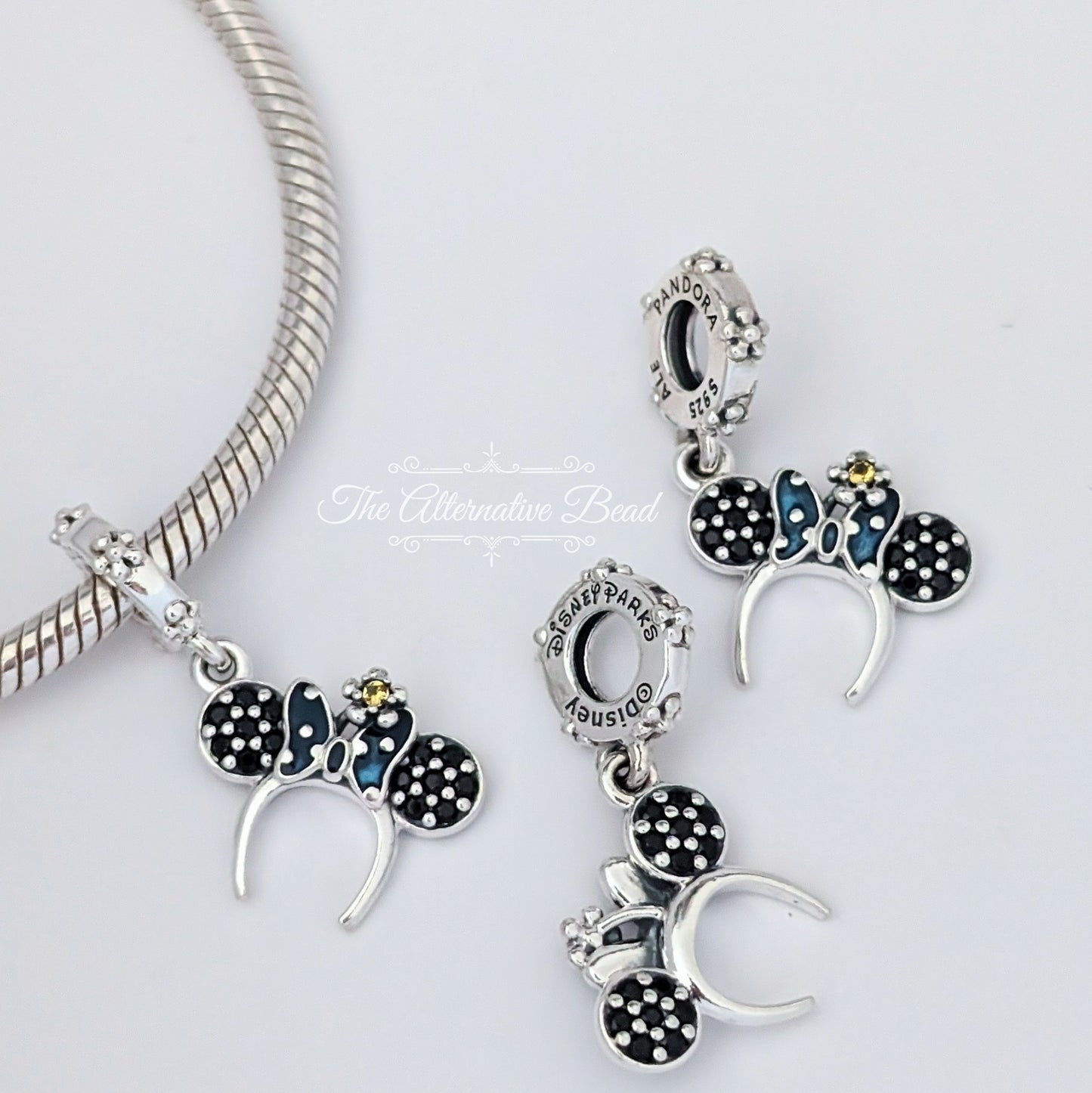 Disney x Pandora Minnie Mouse Ear Headband Dangle silver; blue; black sterling-silver Dangle by The Alternative Bead. Your official Disney x Pandora Retailer from Germany