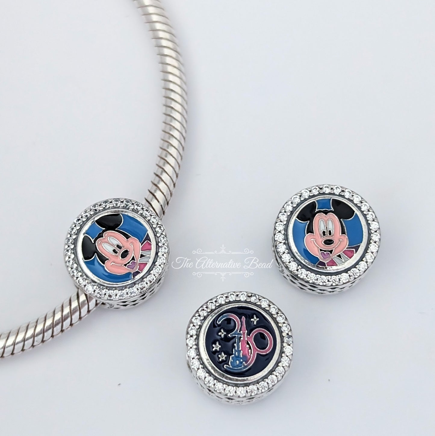Disney x Pandora Disneyland Paris 30th Anniversary Mickey Mouse silver; blue sterling-silver Bead by The Alternative Bead. Your official Disney x Pandora Retailer from Germany