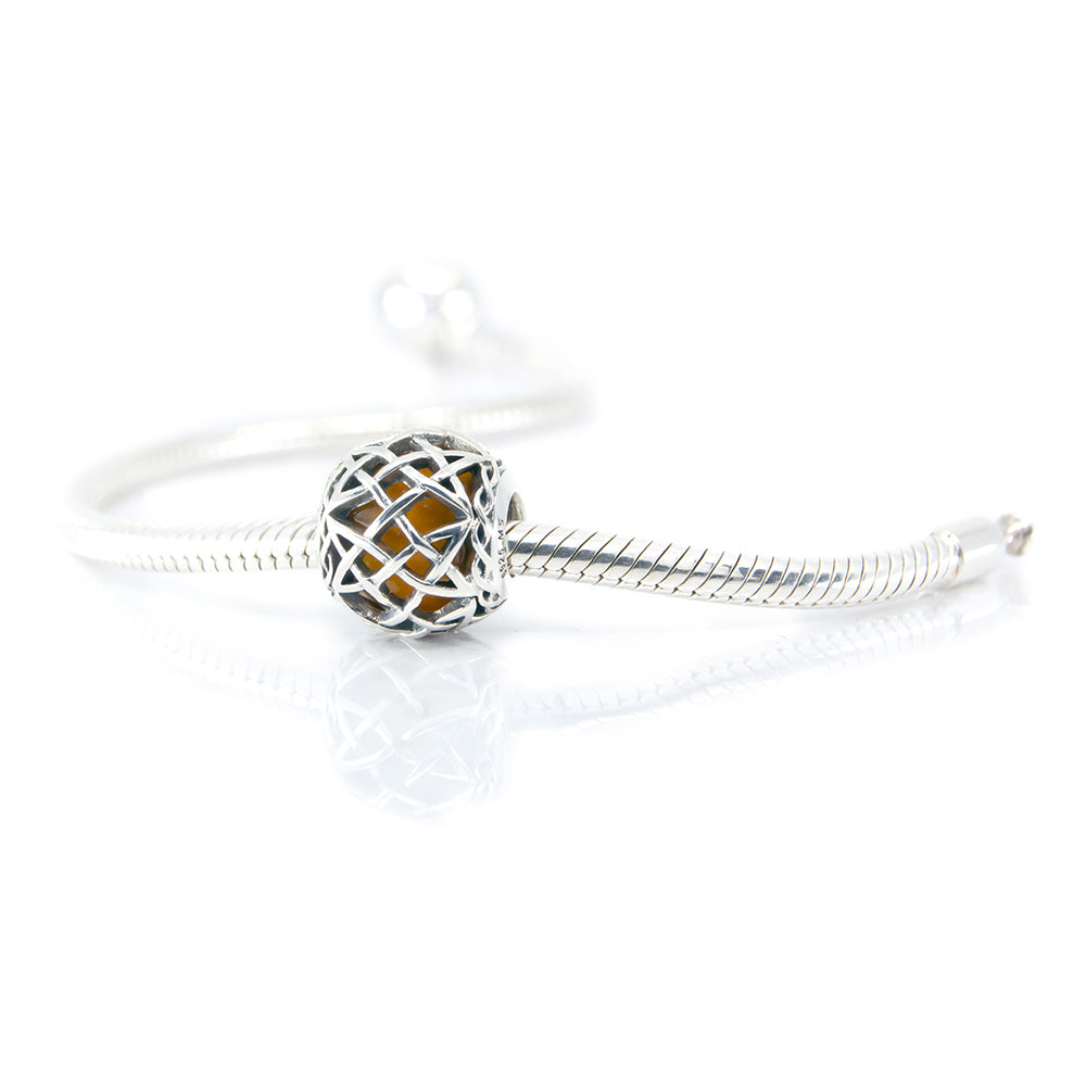 Aurora Charm Irish Celtic Eternity Amber Bead silver; orange sterling-silver; glass Bead by The Alternative Bead. Your official Aurora Charm Retailer from Germany