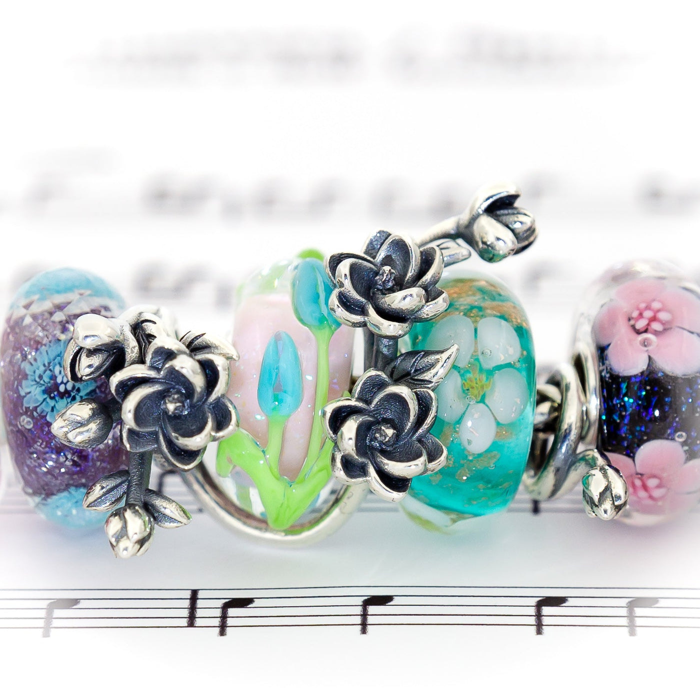 Elfbeads Magnolia Flowerhugs (S220404) silver sterling-silver Charm - The Alternative Bead official German Retailer. Buy 4 get 5 - free DHL Shipping for all orders above 150€
