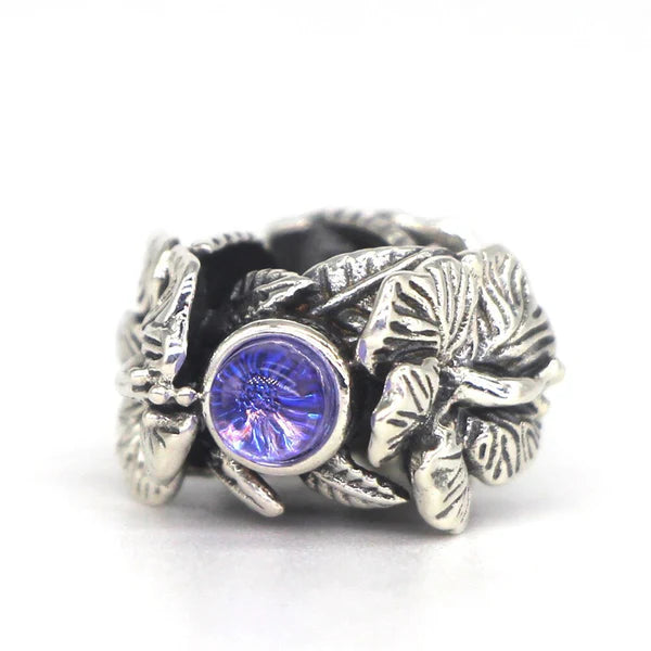 VIP-CHARMS Hibiscus Stopper Spacer Charm Bead (DG44) silver and blue glass and natural-stone and sterling-silver Stopper by The Alternative Bead. Your Official VIP-CHARMS Retailer from Germany