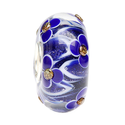 Ogerbeads Delft Blue Glitter Flame Flowers blue; white; gold glass Bead by The Alternative Bead. Your official Ogerbeads Retailer from Germany