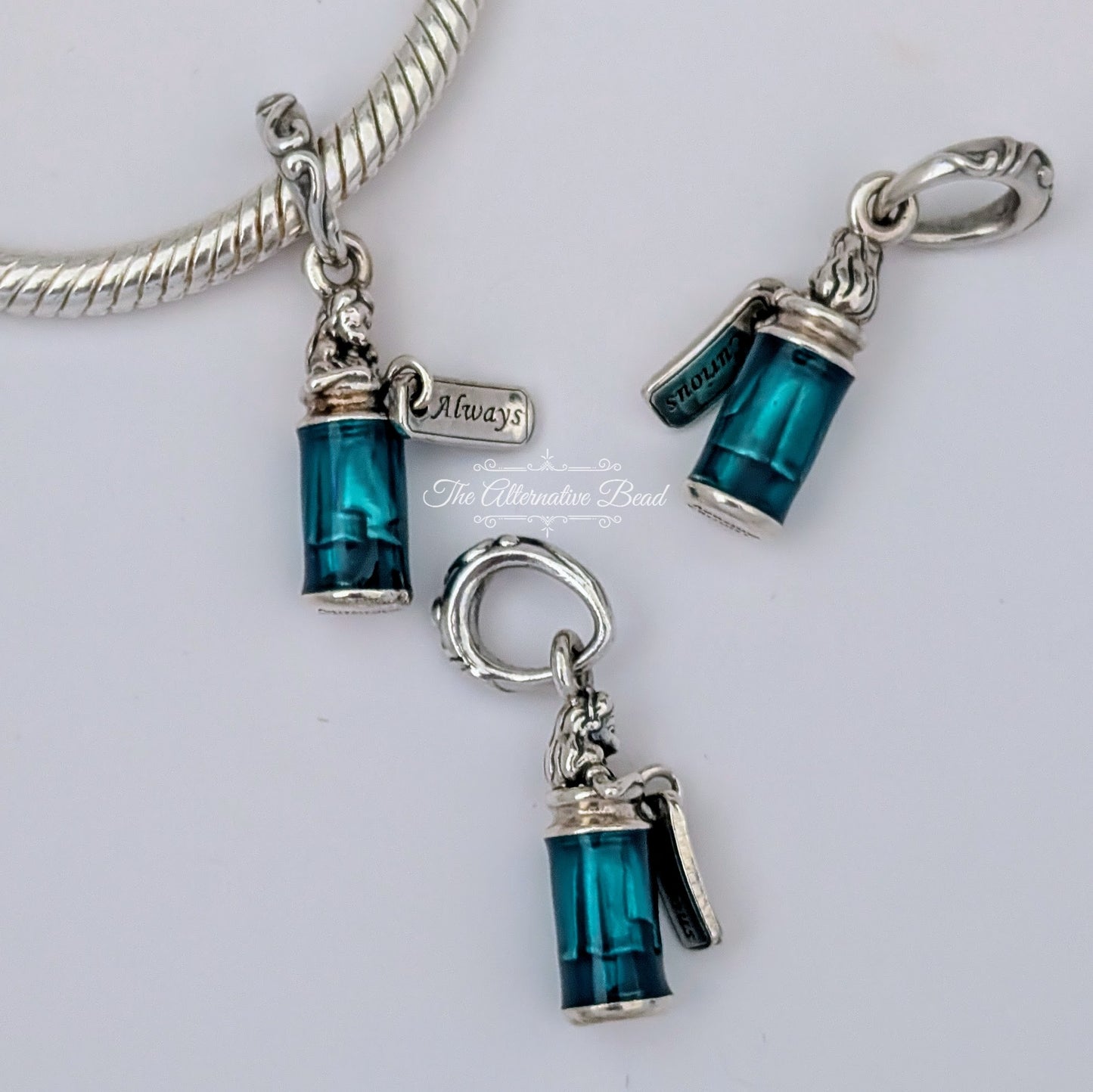 Disney x Pandora Disney Alice in Wonderland Drink Me Dangle Charm (799334C01)) blue sterling-silver and enamel Dangle by The Alternative Bead. Your Jewelry Retailer from Germany
