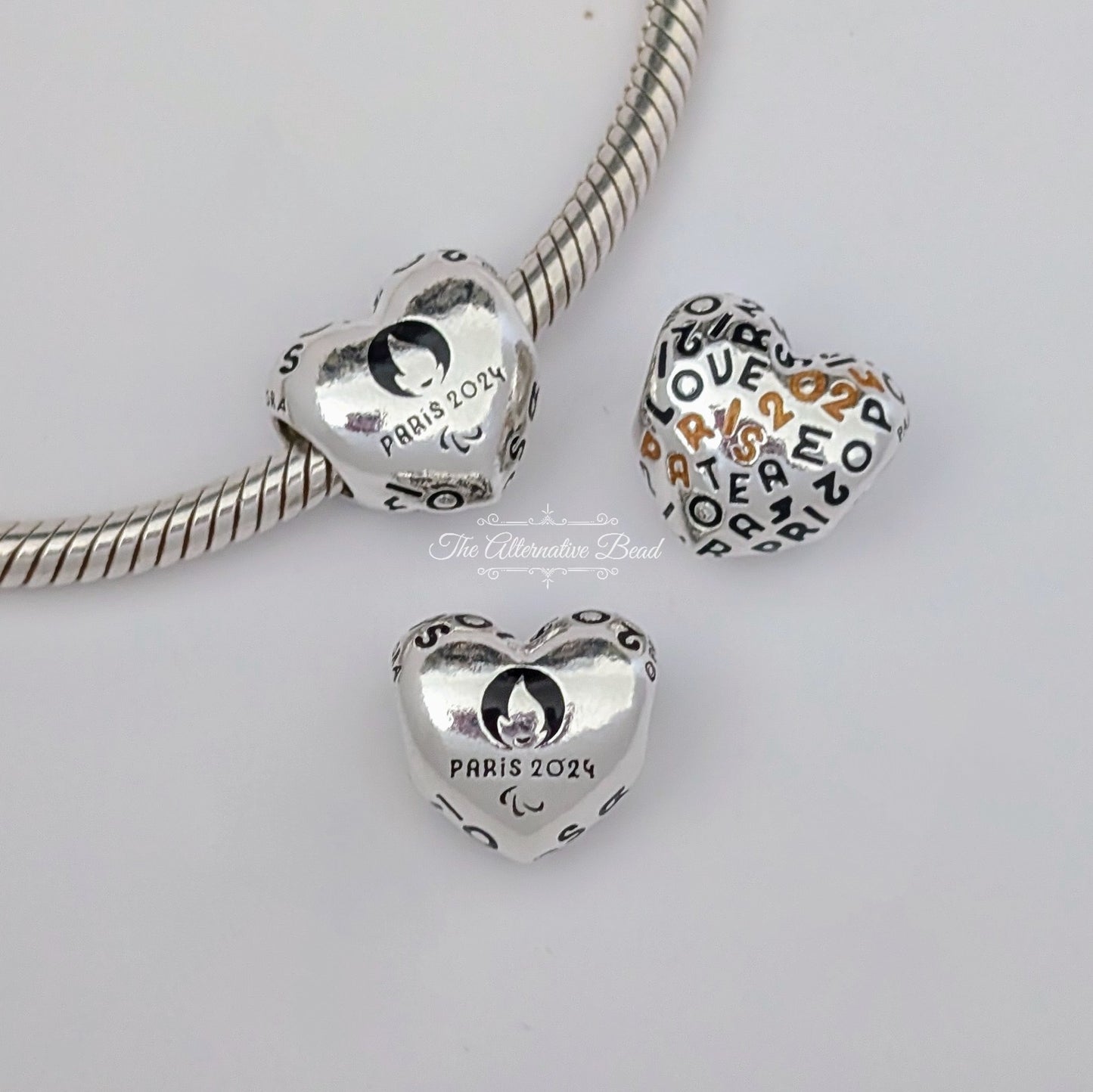 Pandora Paris Olympics 2024 Heart black; silver; gold sterling-silver Bead by The Alternative Bead. Your official Pandora Retailer from Germany