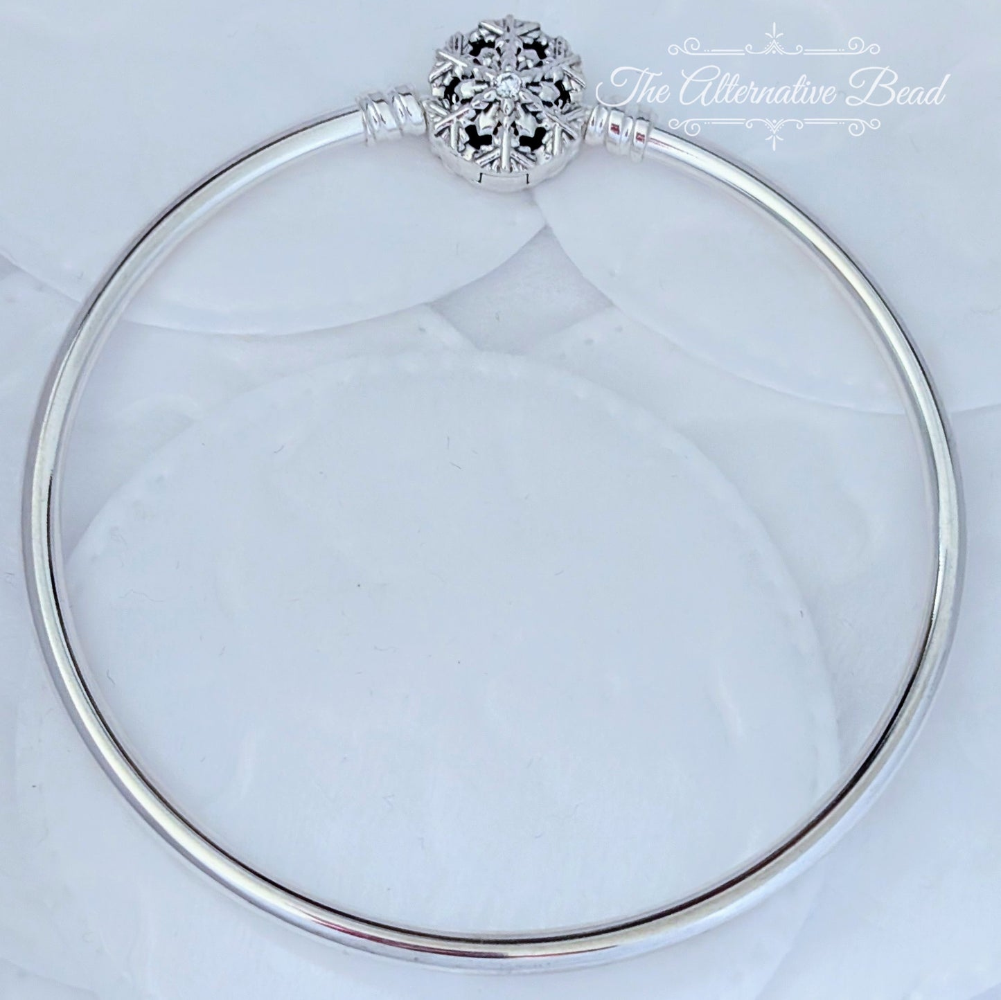 Pandora Moments Sparkling Snowflake Clasp Bangle silver sterling-silver Bangle by The Alternative Bead. Your official Pandora Retailer from Germany