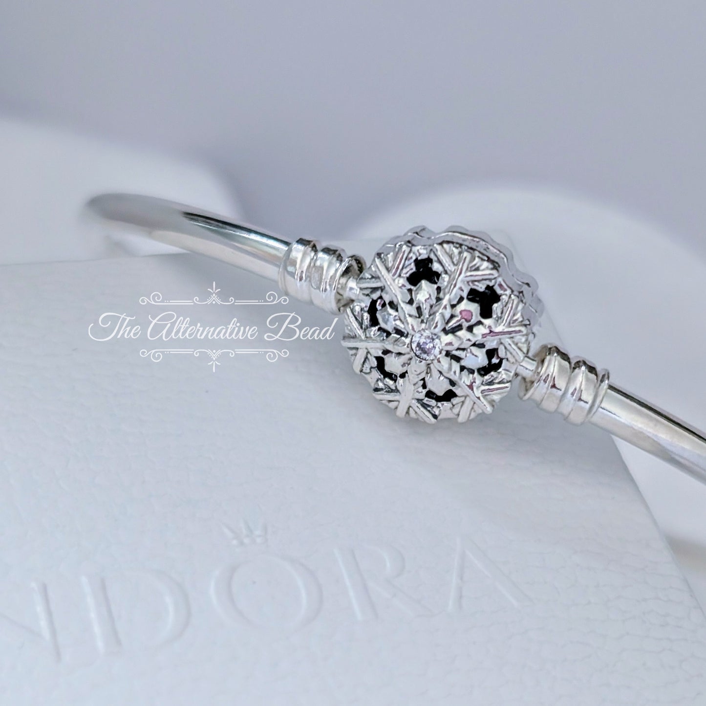 Pandora Moments Sparkling Snowflake Clasp Bangle silver sterling-silver Bangle by The Alternative Bead. Your official Pandora Retailer from Germany