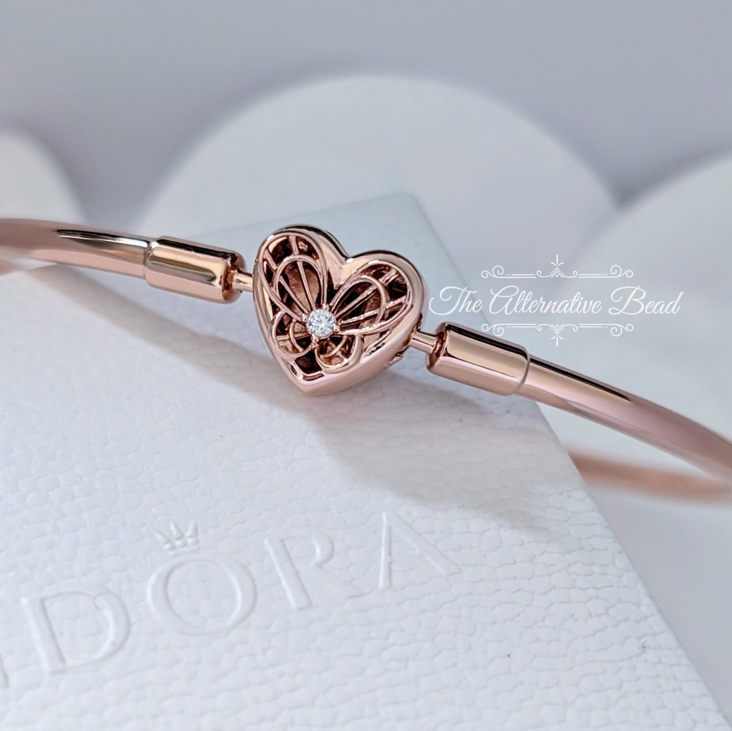 Pandora Moments Heart & Butterfly Bangle (Rose) rose-gold rose-gold Bangle by The Alternative Bead. Your official Pandora Retailer from Germany