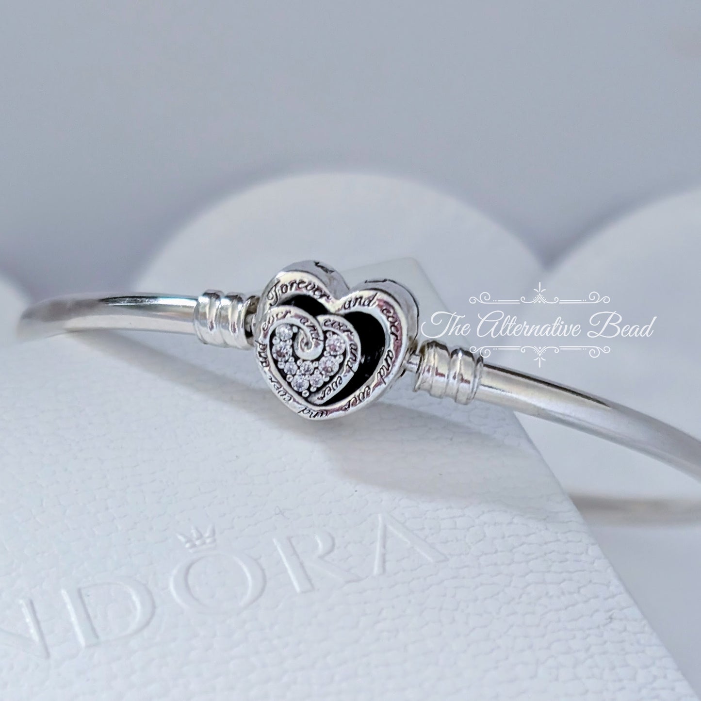 Pandora Moments Entwined Infinite Hearts Clasp Bangle (591064C01) silver sterling-silver Bangle by The Alternative Bead. Your Jewelry Retailer from Germany