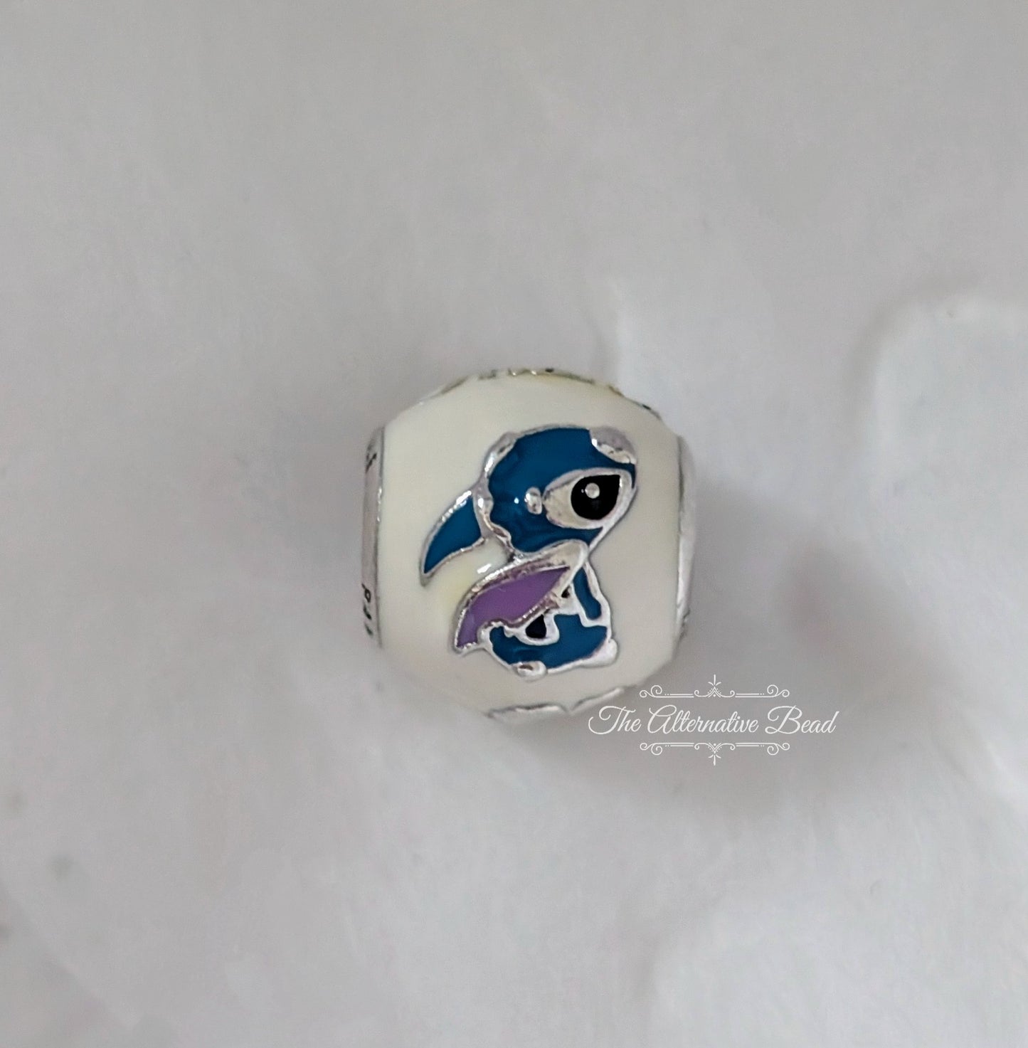 Disney x Pandora Lilo & Stitch Charm with White Enamel white; blue; red; black; purple enamel; sterling-silver Bead by The Alternative Bead. Your official Disney x Pandora Retailer from Germany