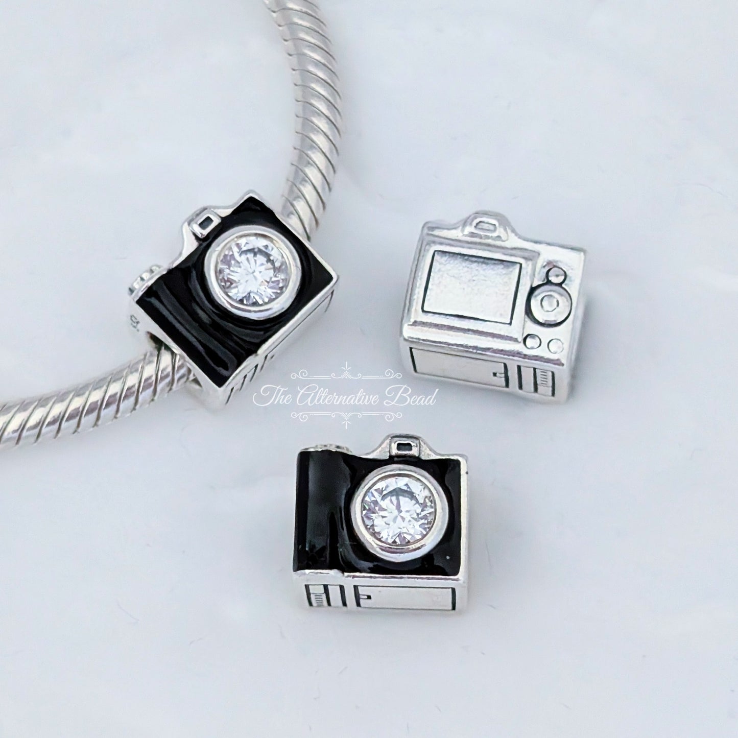 Pandora Camera Silver Charm with Black Enamel and Cubic Zirconia black; silver sterling-silver Bead by The Alternative Bead. Your official Pandora Retailer from Germany