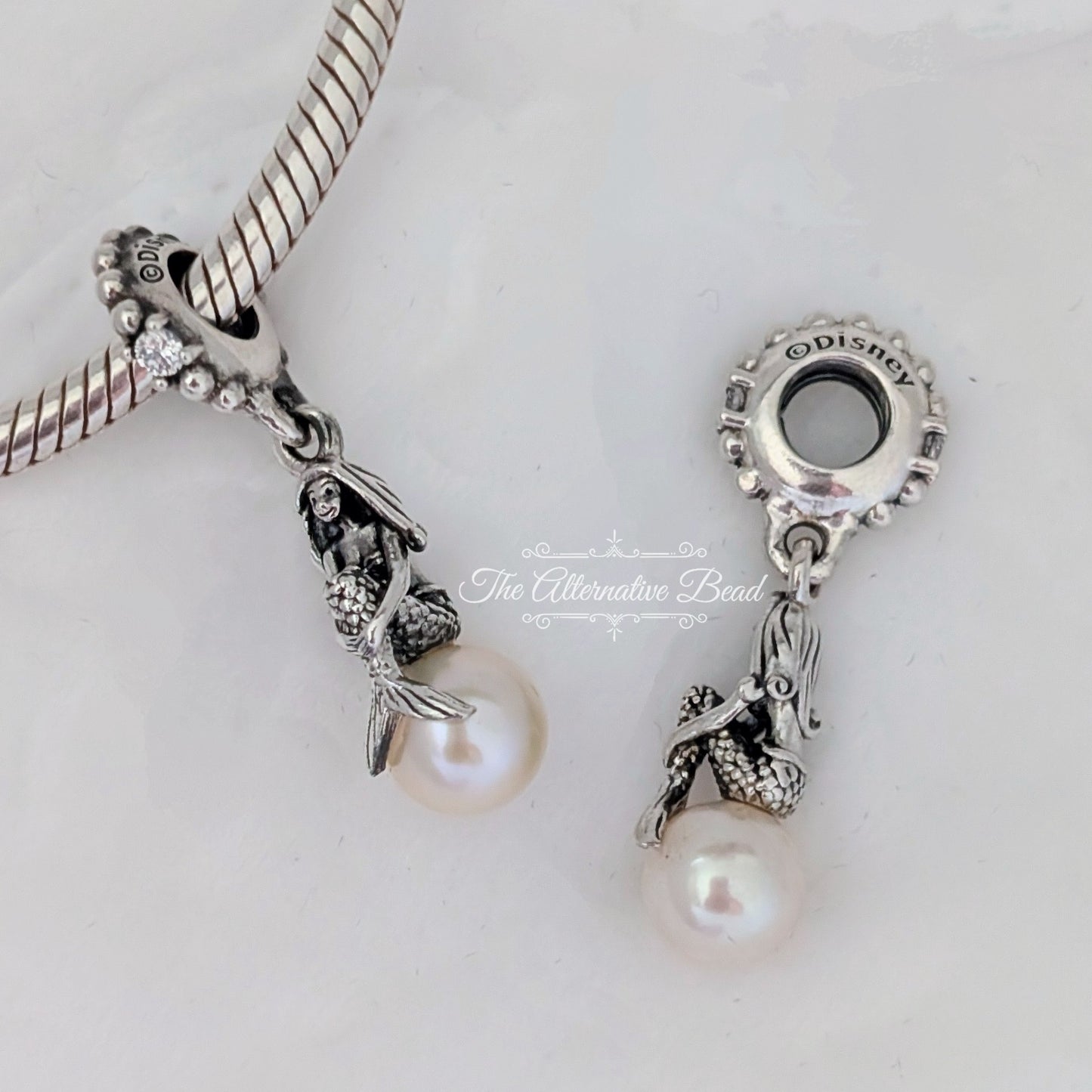 Disney x Pandora Luminous Ariel Dangle silver; white sterling-silver Dangle by The Alternative Bead. Your official Disney x Pandora Retailer from Germany