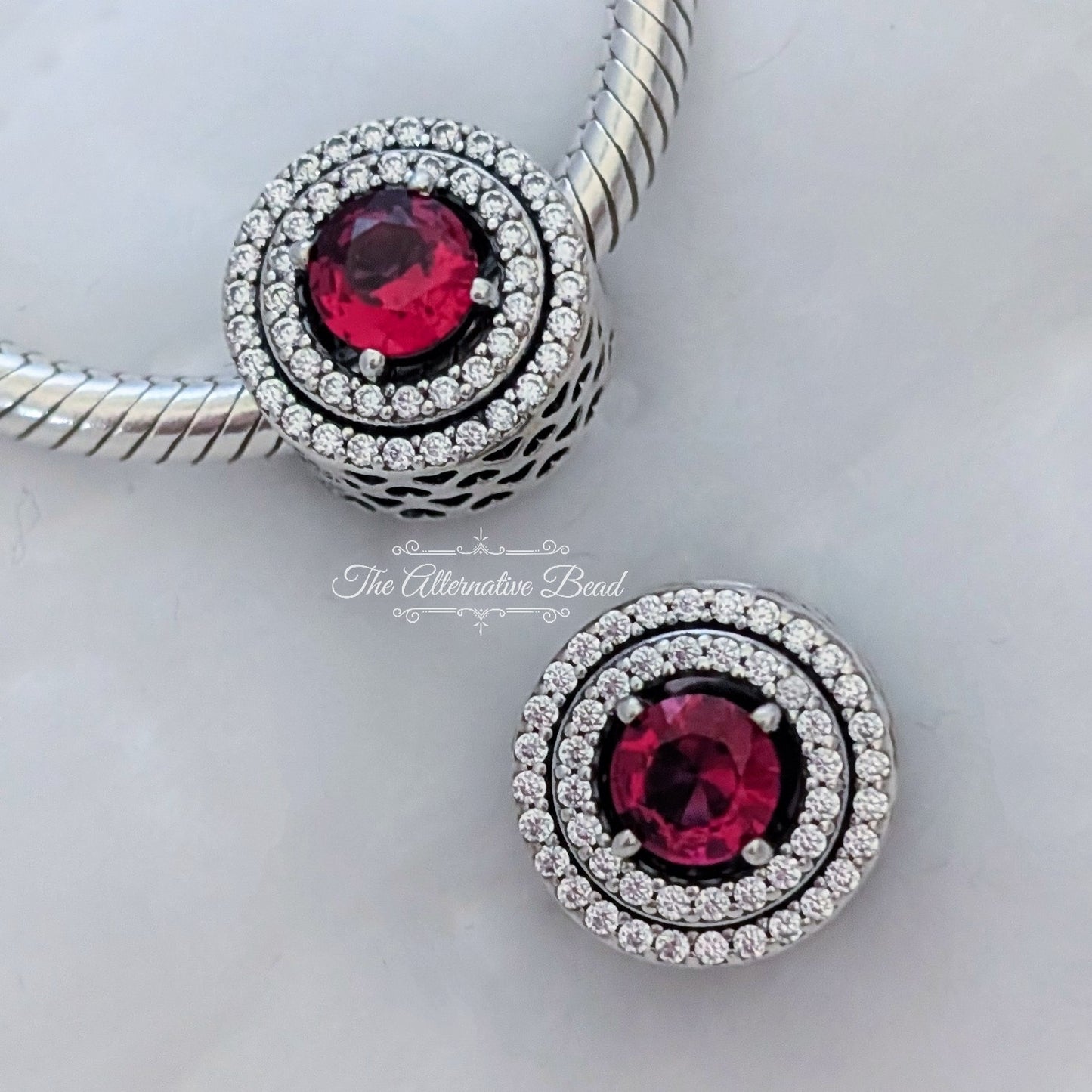 Pandora Red Sparkling Leveled Timeless Round Charm red sterling-silver Bead by The Alternative Bead. Your official Pandora Retailer from Germany
