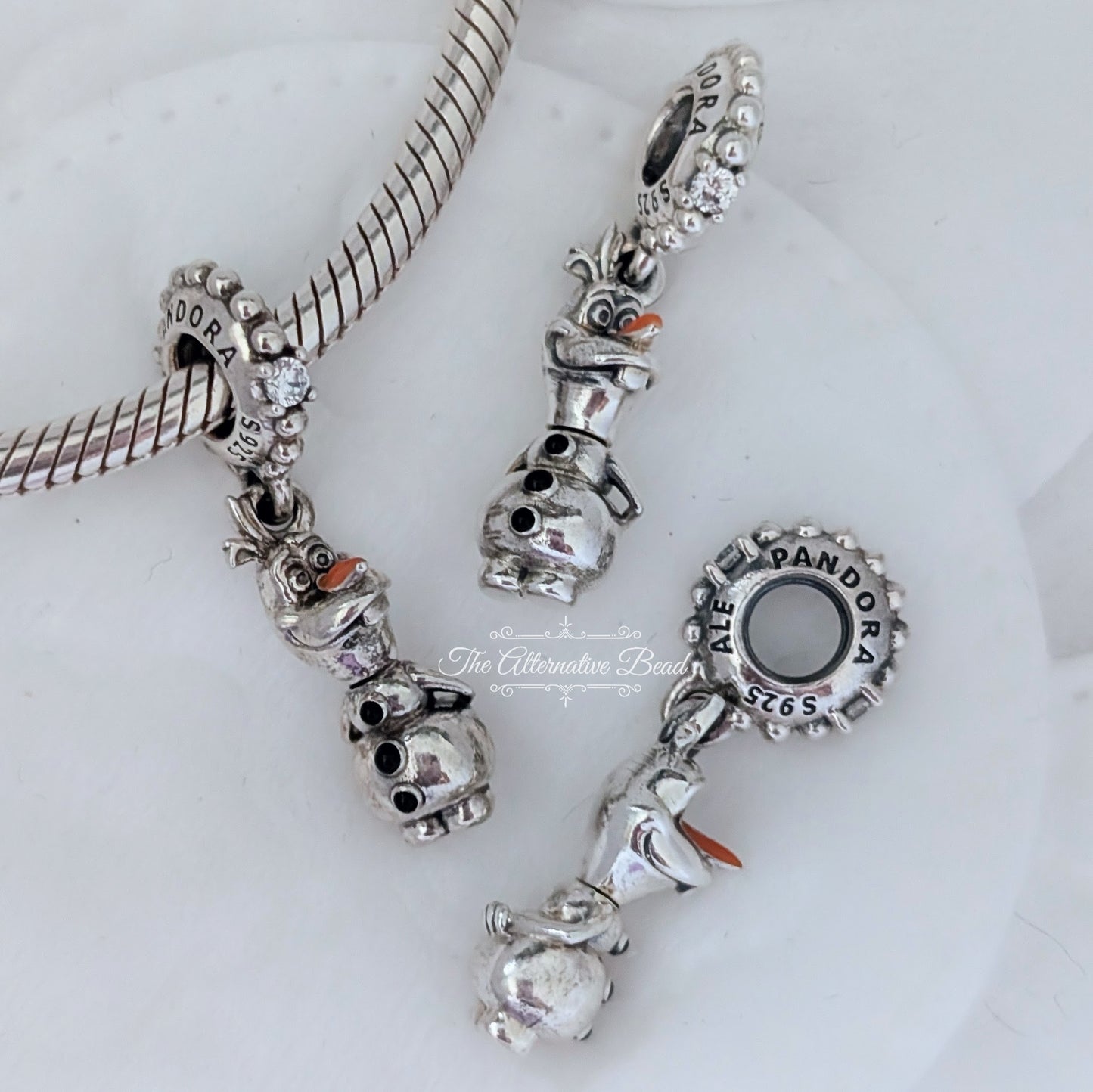 Disney x Pandora Olaf Dangle Charm silver; orange sterling-silver Dangle by The Alternative Bead. Your official Disney x Pandora Retailer from Germany