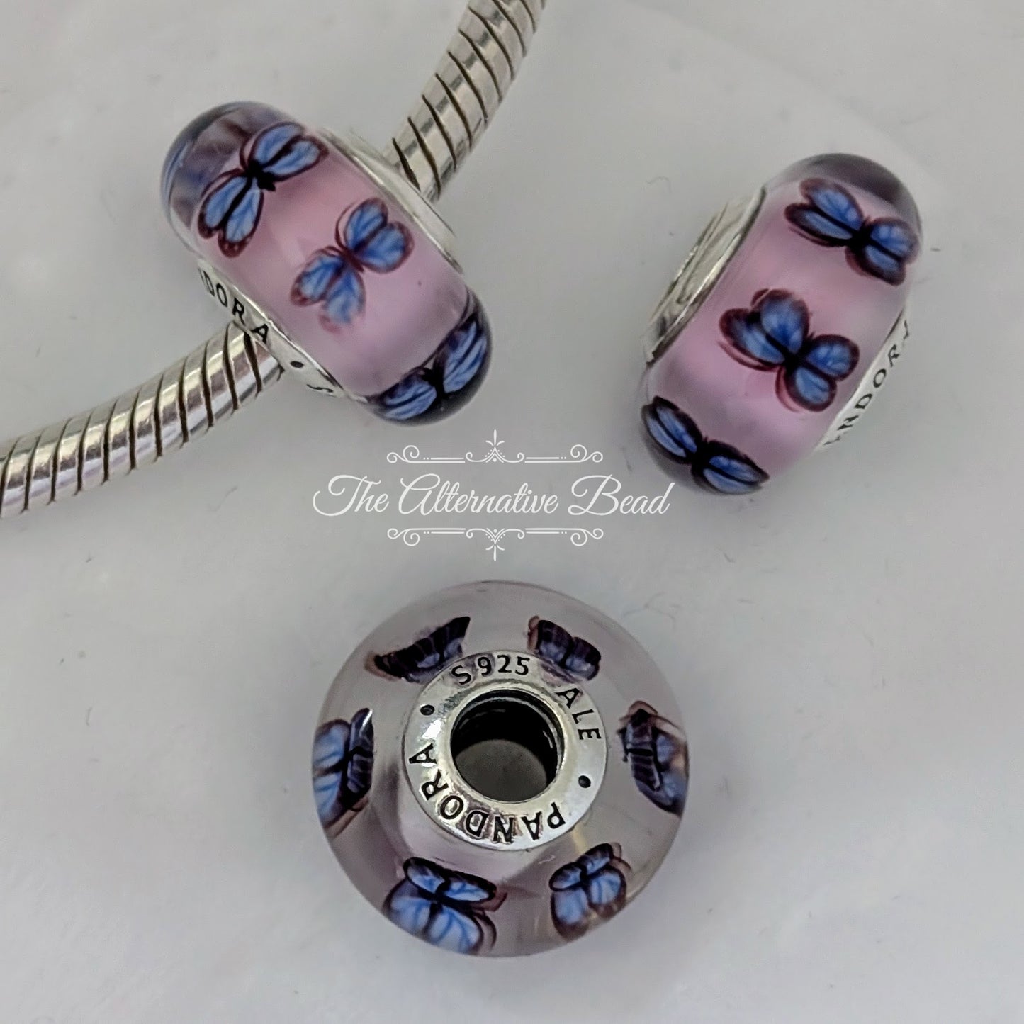 Pandora Pink & Purple Butterfly Murano pink; purple; blue glass Bead by The Alternative Bead. Your official Pandora Retailer from Germany