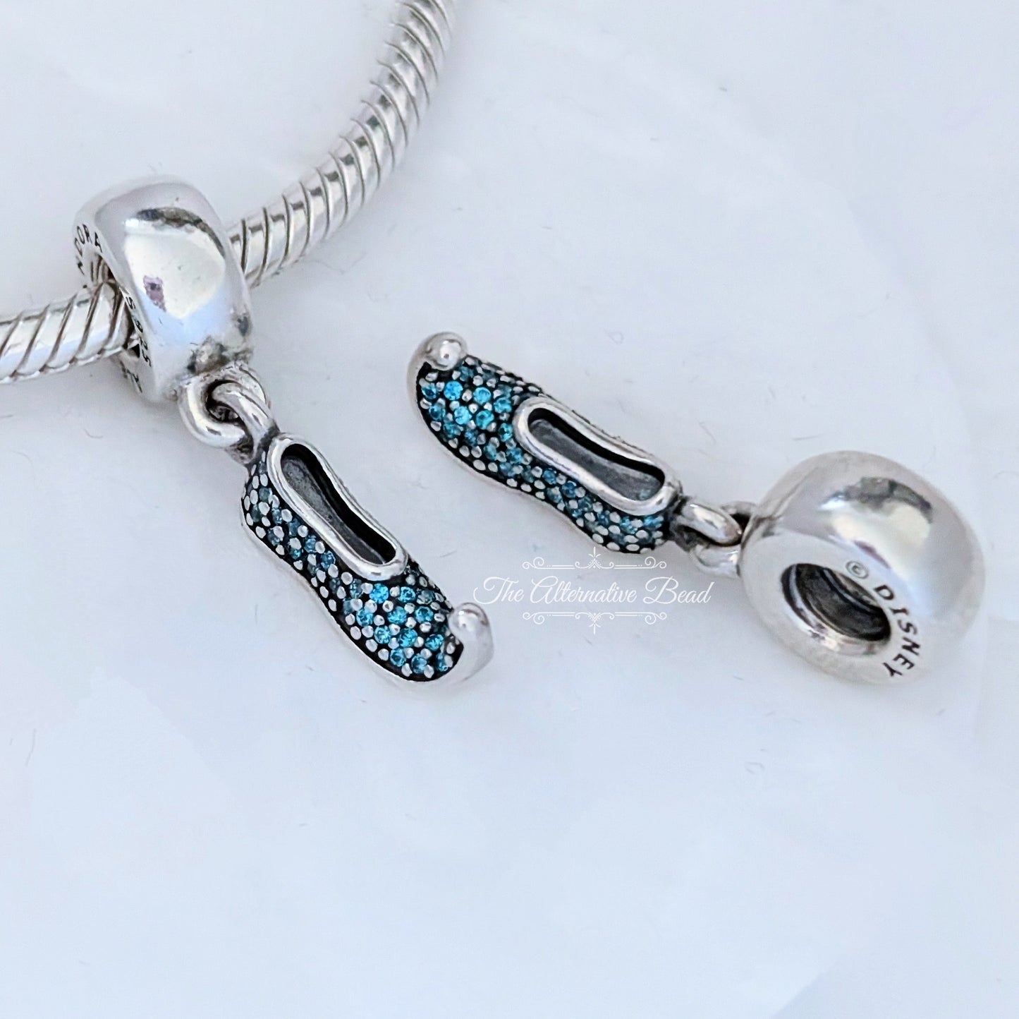 Disney x Pandora Princess Jasmine's Sparkling Slipper Dangle blue; green sterling-silver Dangle by The Alternative Bead. Your official Disney x Pandora Retailer from Germany