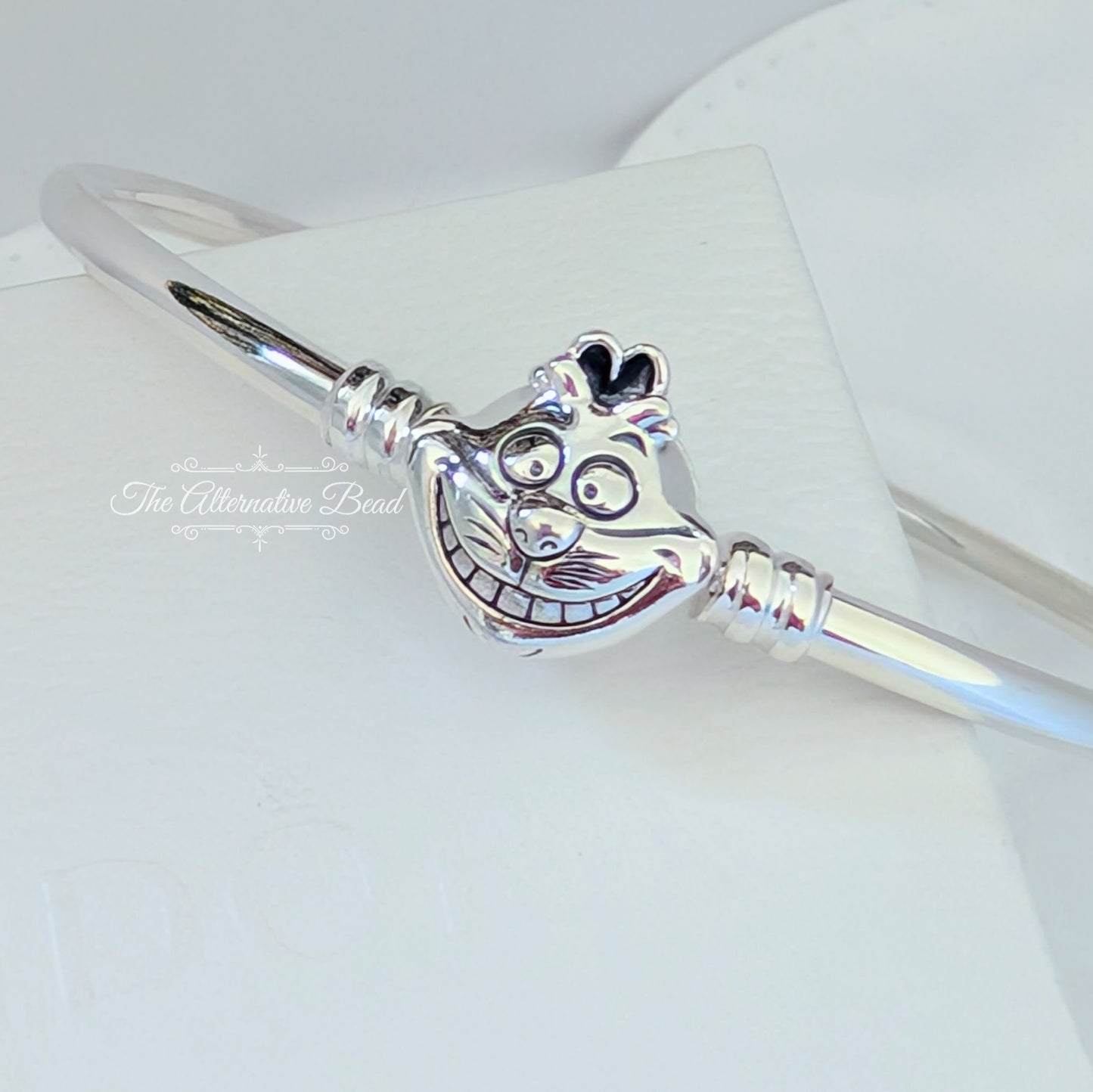 Disney x Pandora Alice in Wonderland Cheshire Cat Clasp Bangle (599343C00) silver sterling-silver Bangle by The Alternative Bead. Your Jewelry Retailer from Germany