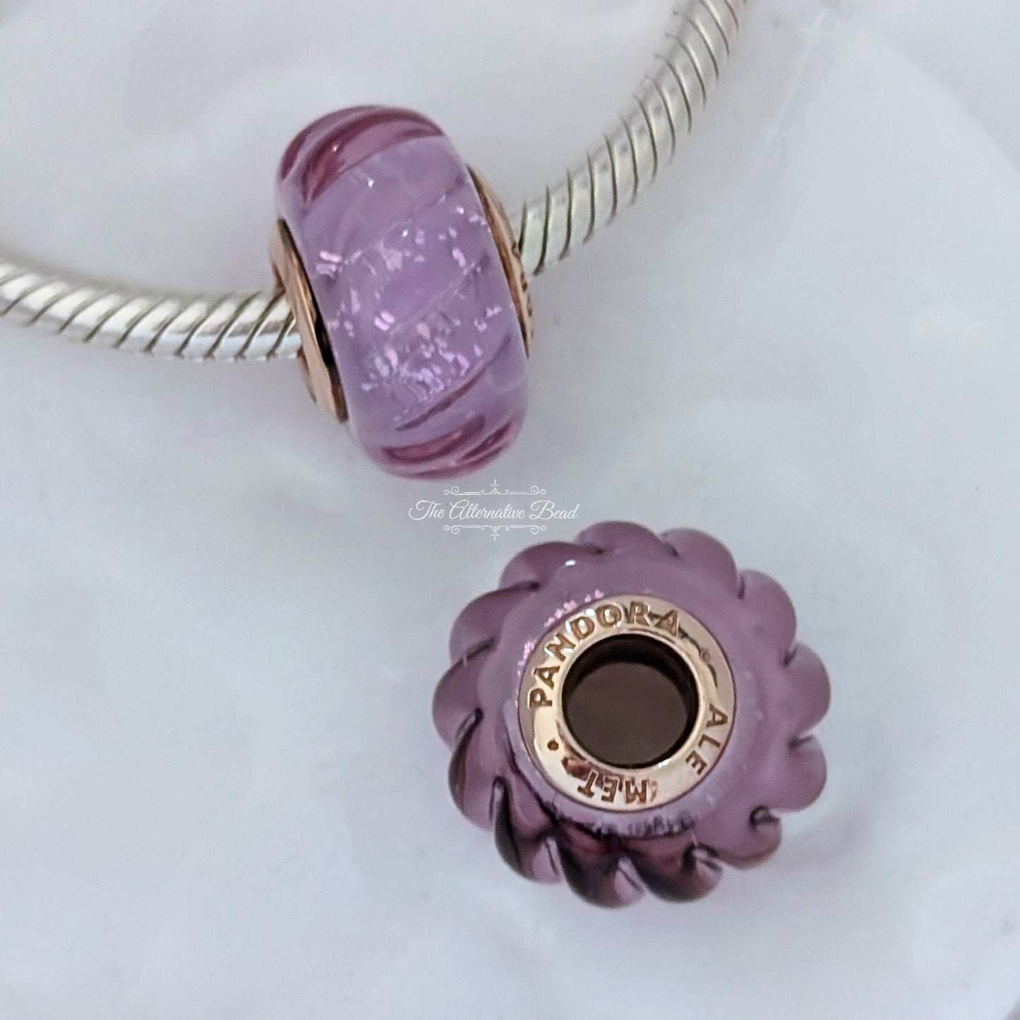 Pandora Groove 14k rose gold-plated charm with iridescent, pink and purple Murano glass (788107) purple glass and rose-gold Bead by The Alternative Bead. Your Jewelry Retailer from Germany