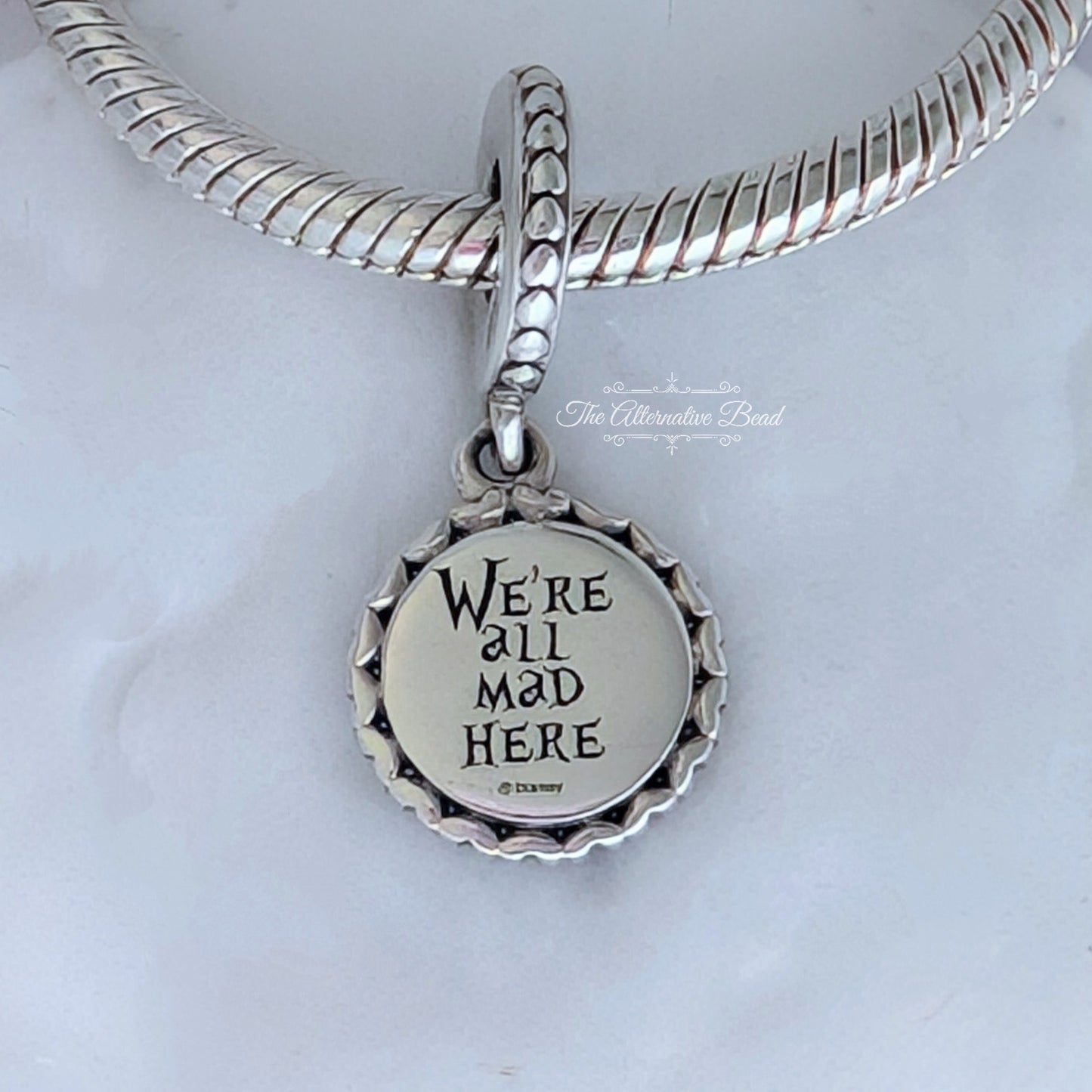 Disney x Pandora Cheshire Cat We're All Mad Here Dangle silver; pink; black sterling-silver; enamel Dangle by The Alternative Bead. Your official Disney x Pandora Retailer from Germany