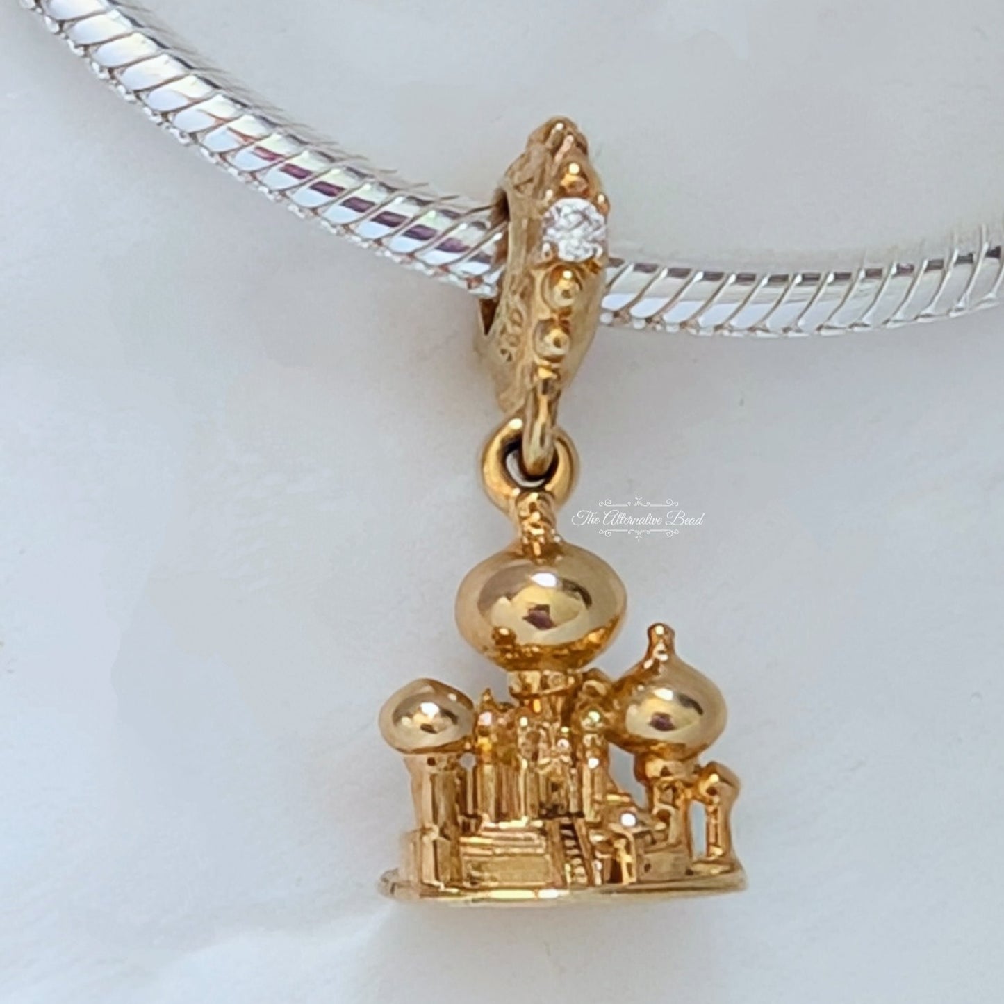 Disney x Pandora Aladdin Agrabah Castle Dangle Charm gold sterling-silver; gold-plated Dangle by The Alternative Bead. Your Jewelry Retailer from Germany