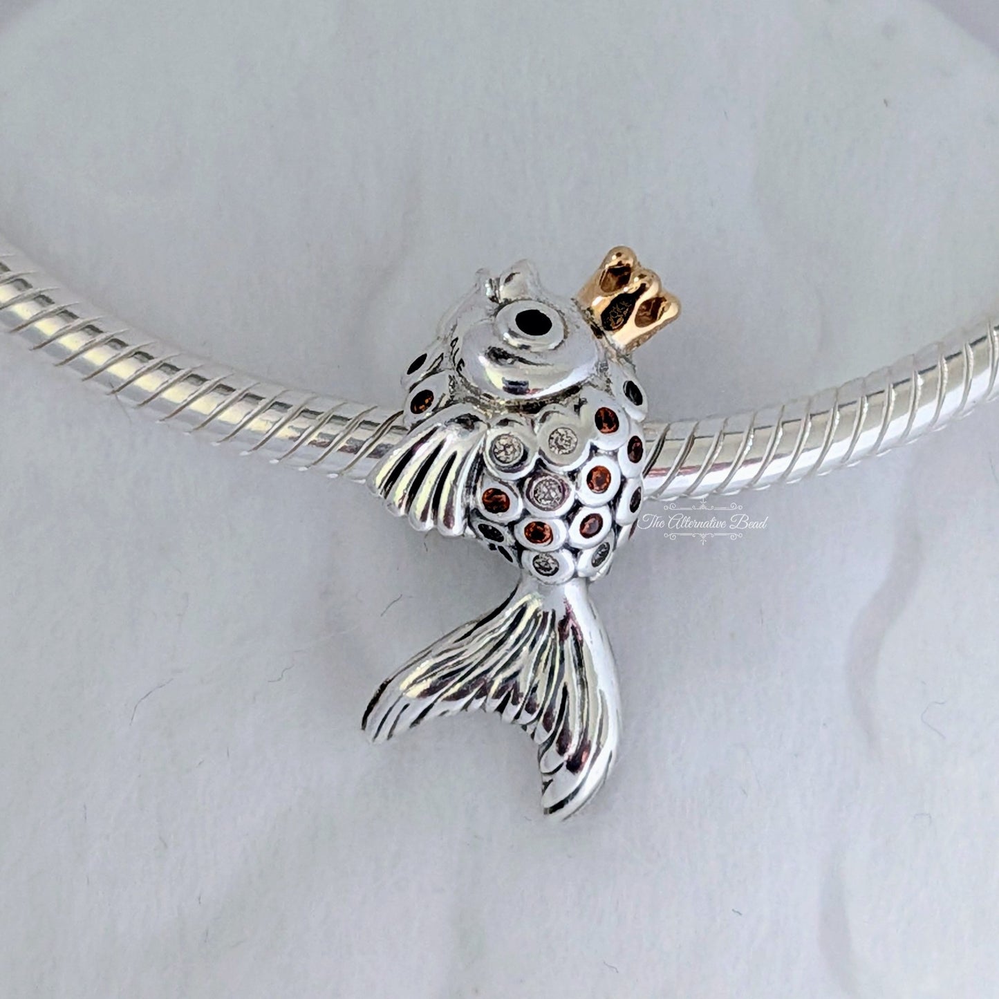 Pandora Fairytale fish silver charm with 14k, orange and golden coloured cubic zirconia and black crystal silver; gold sterling-silver; gold; crystal Bead by The Alternative Bead. Your Jewelry Retailer from Germany