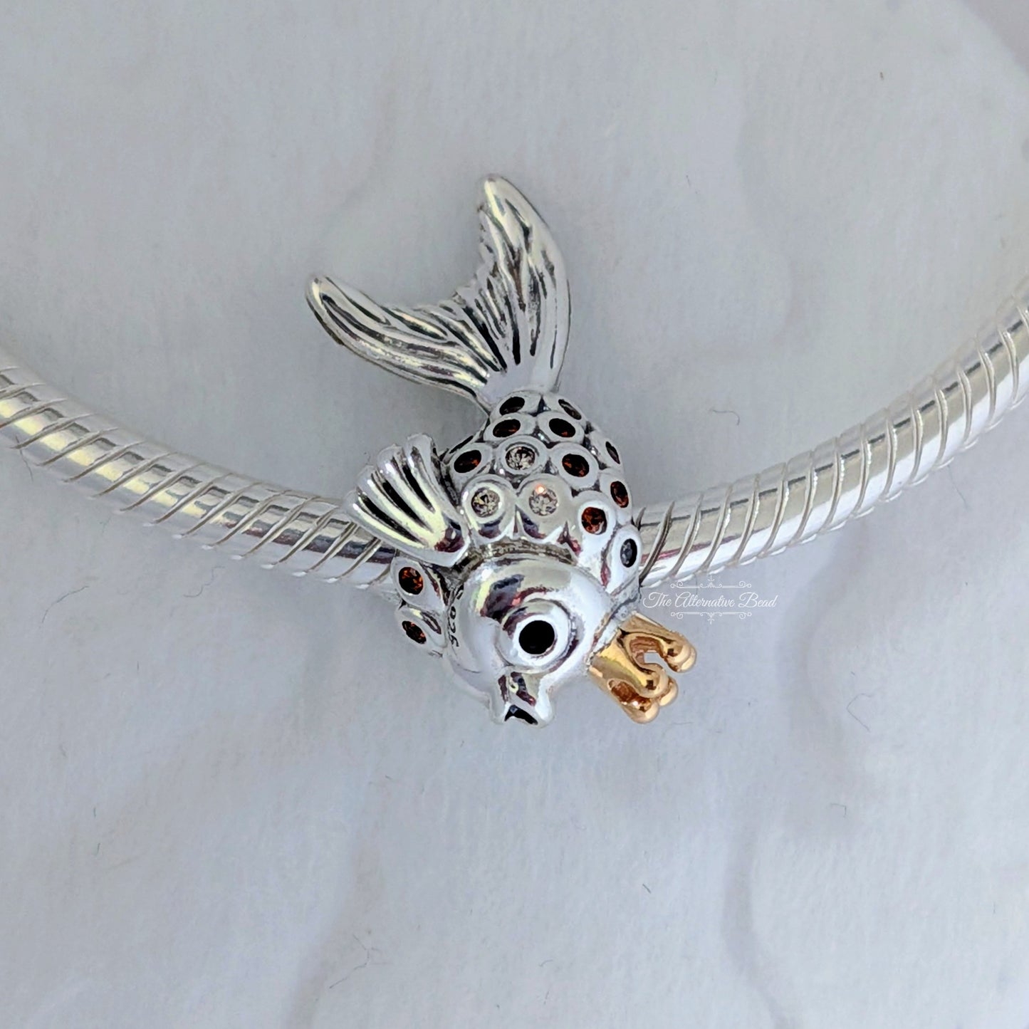 Pandora Fairytale fish silver charm with 14k, orange and golden coloured cubic zirconia and black crystal silver; gold sterling-silver; gold; crystal Bead by The Alternative Bead. Your Jewelry Retailer from Germany